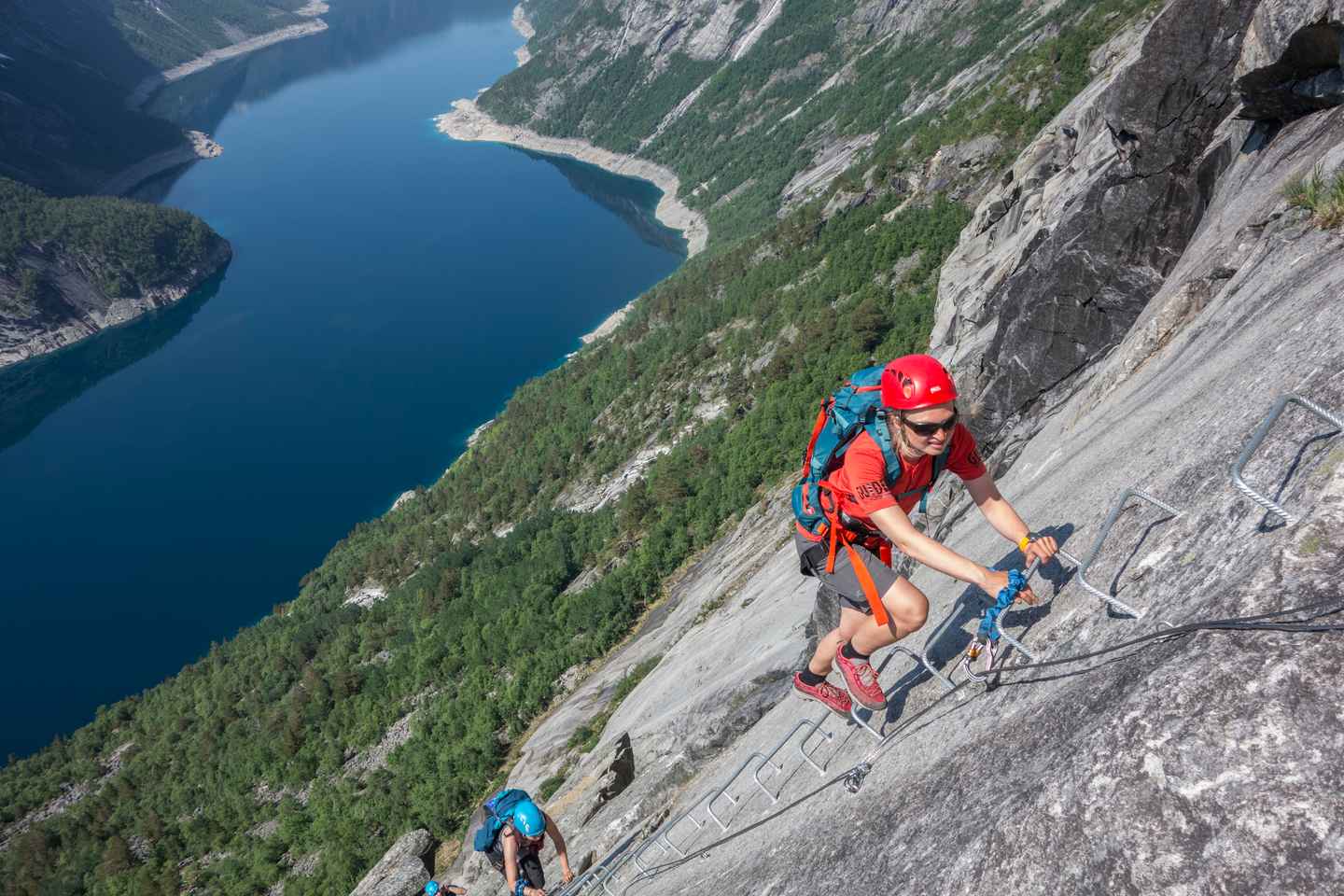 go biking, hiking, and climbing at trolltunga