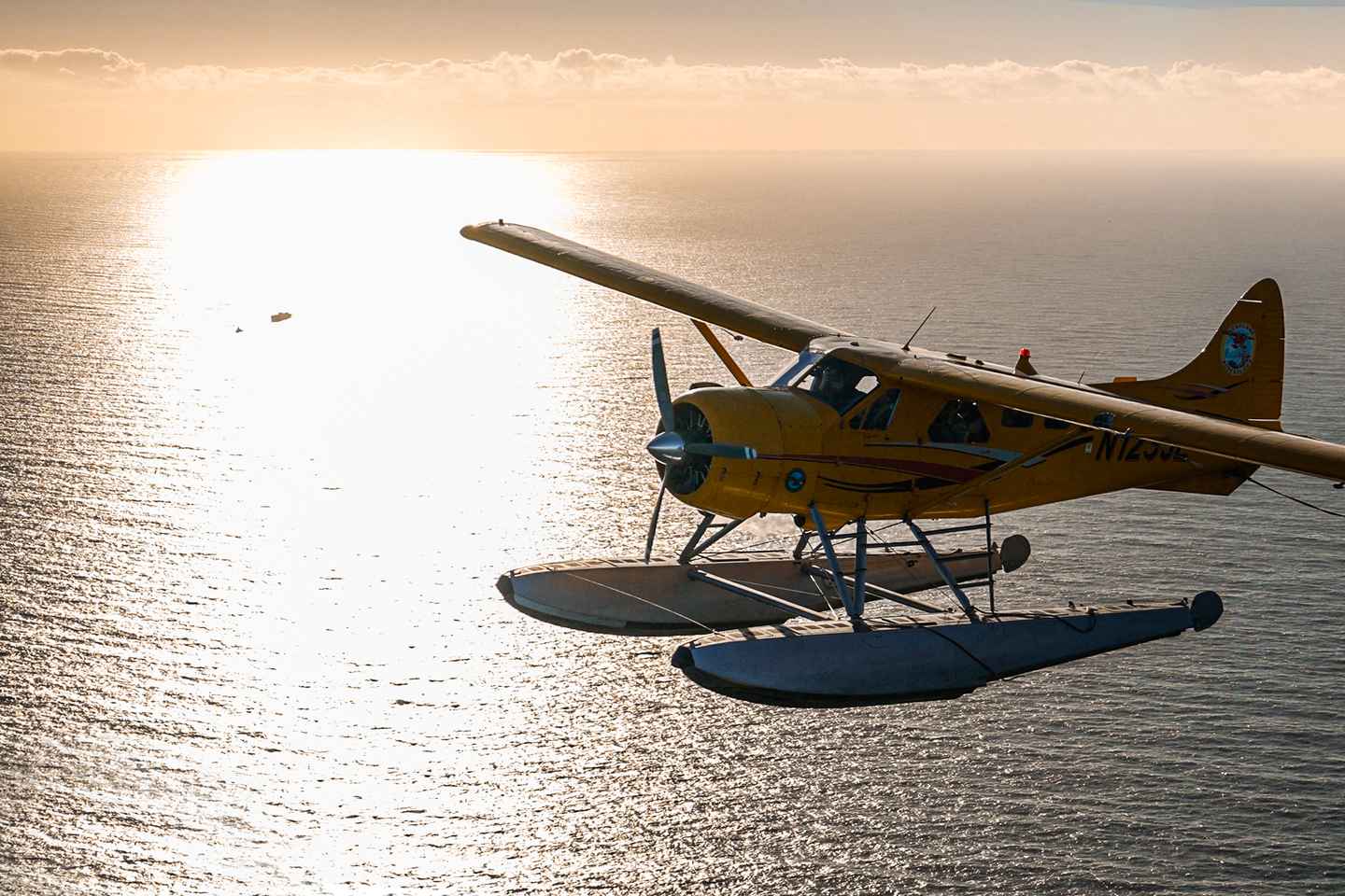 go on a seaplane flight with a glass of champagne