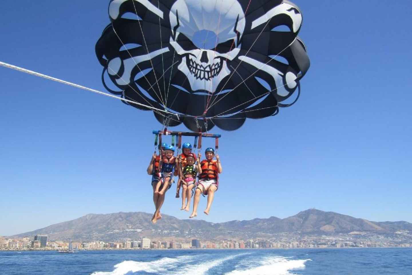things to do in benalmadena spain | soar through the skies from costa del sol with a parasailing flight