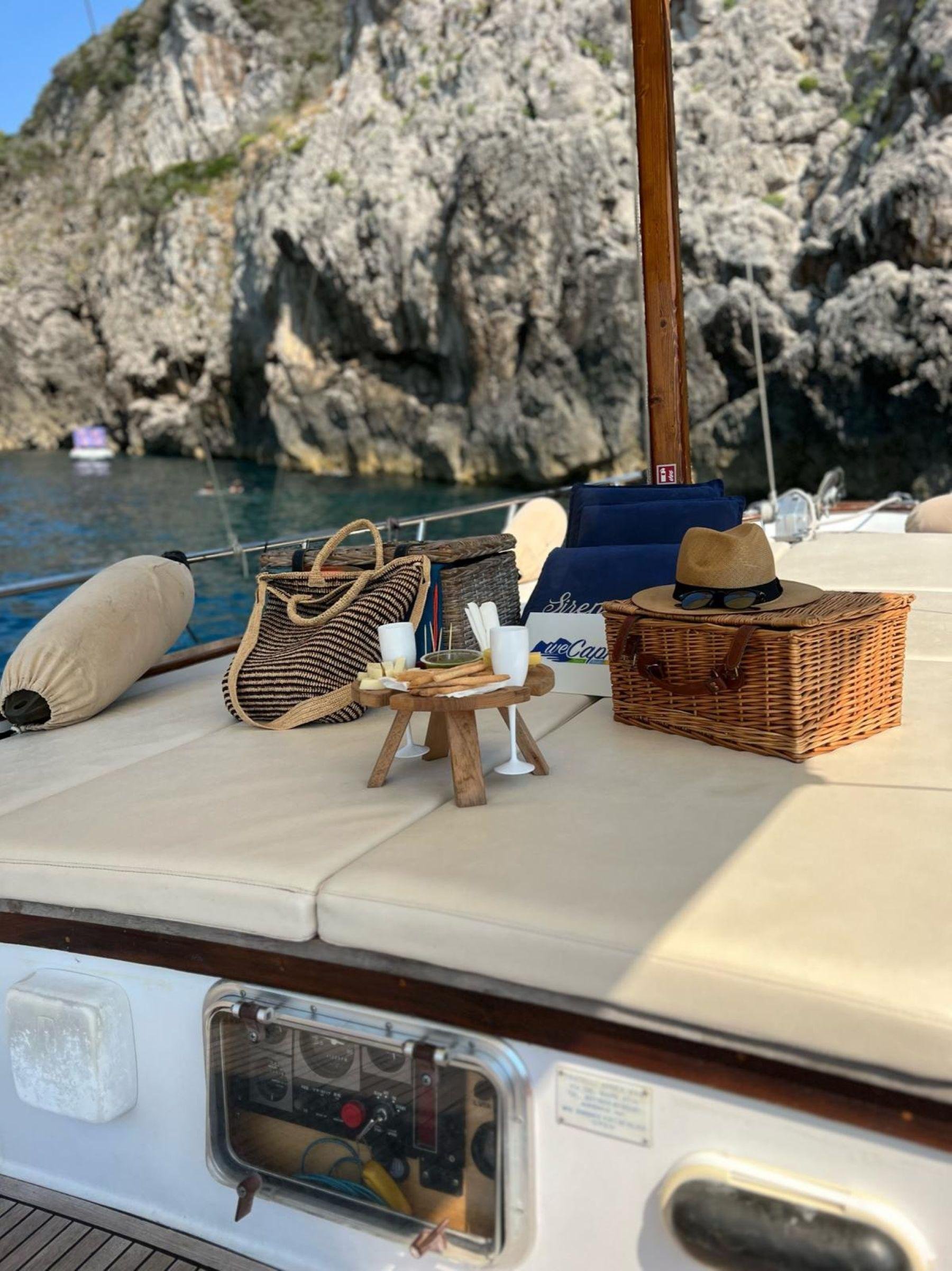 Capri Private Boat Tour: Faraglioni, Sea Caves & Swimming Stops