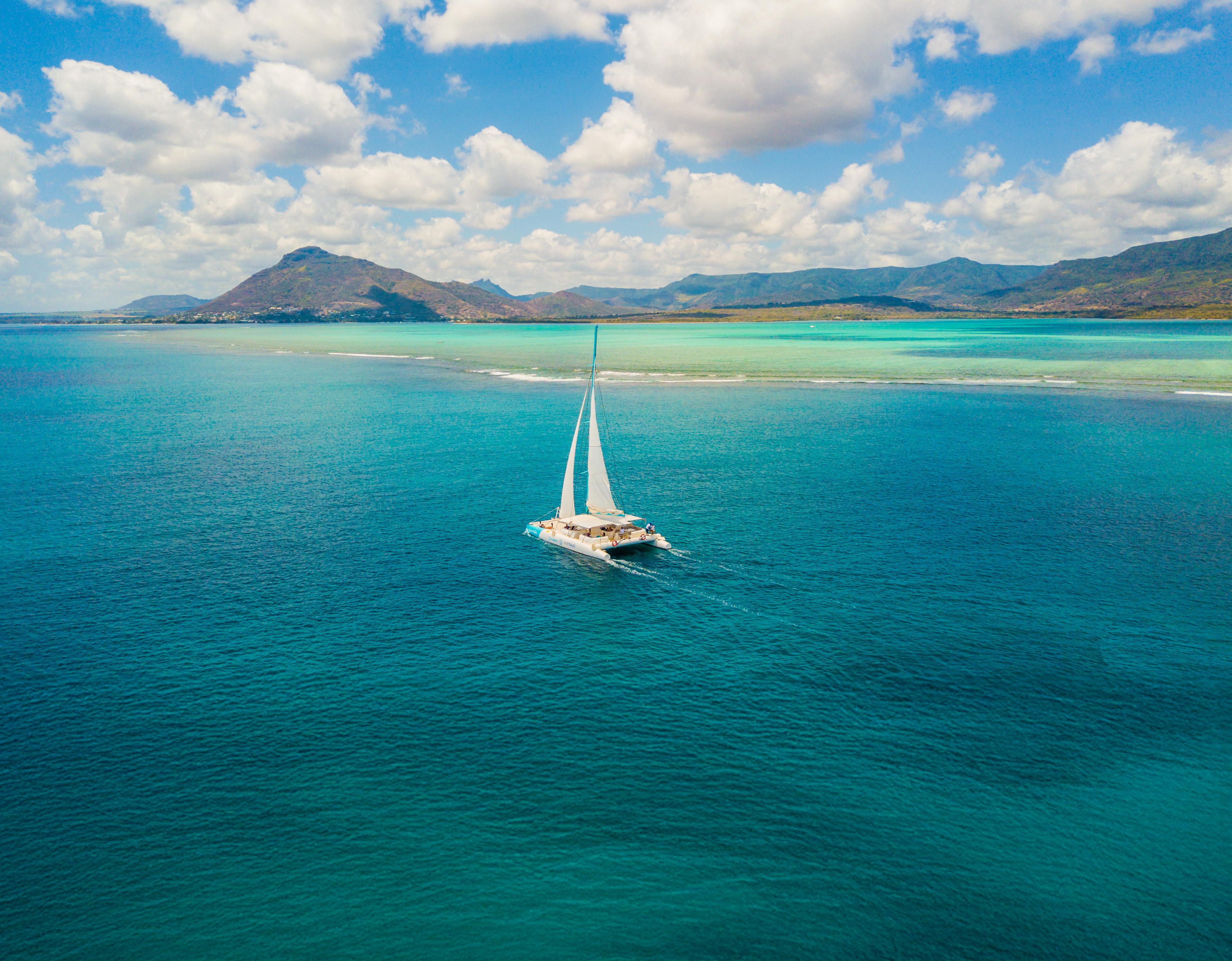 Mauritius West Coast Catamaran Cruise: Dolphins, BBQ & Crystal Rock
