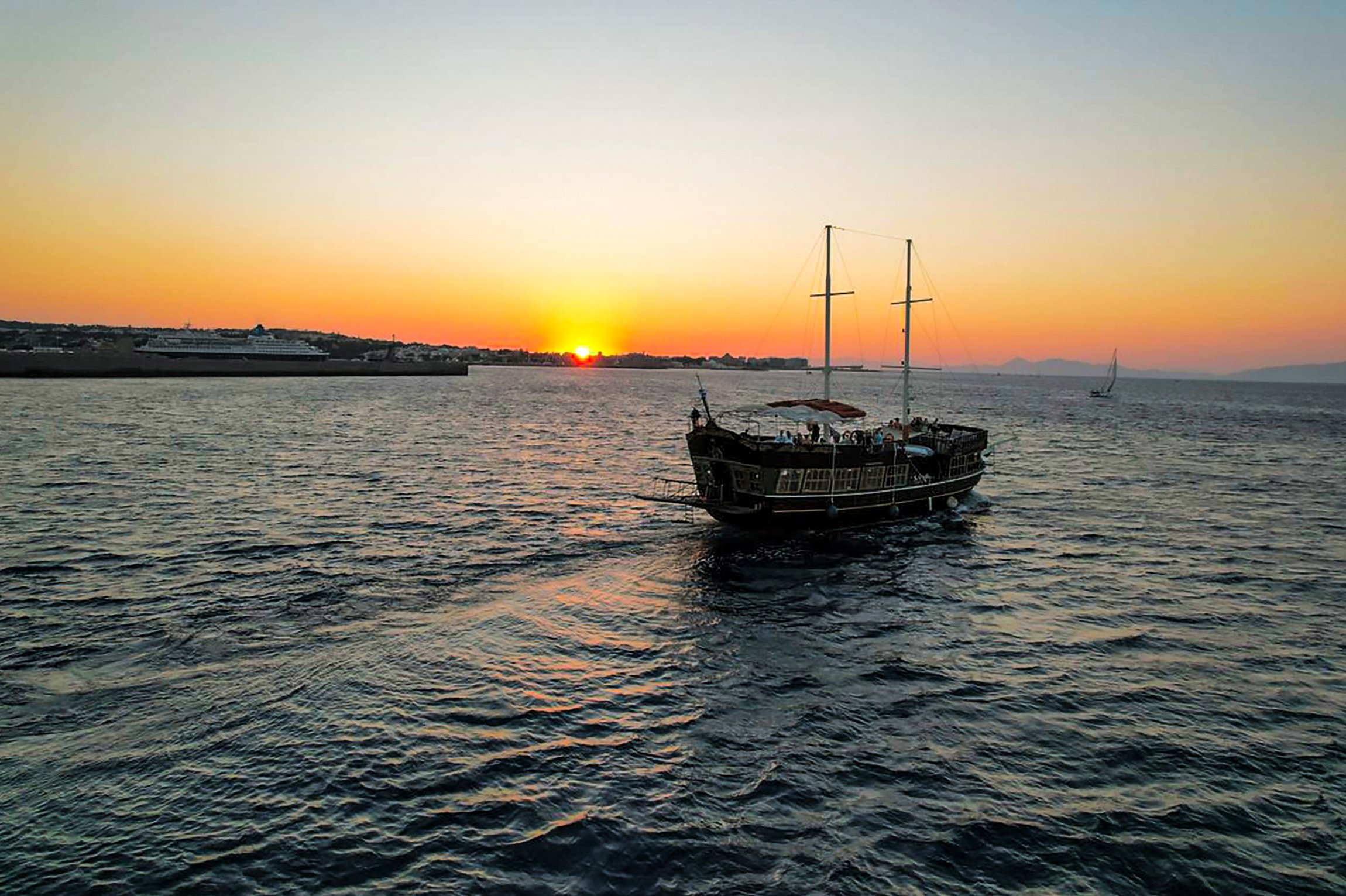 Rhodes Sunset Cruise with Greek BBQ & Unlimited Drinks