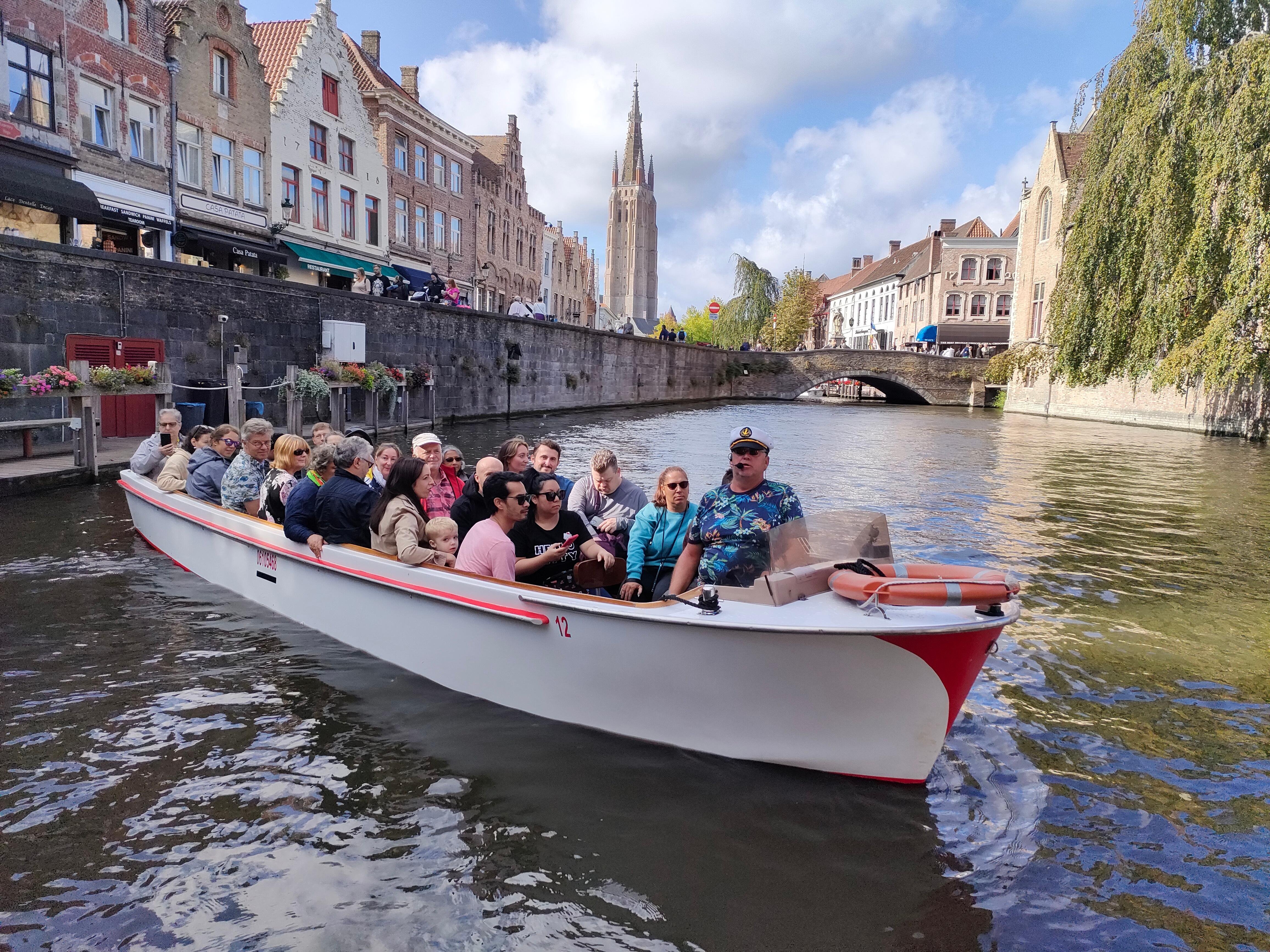 Bruges canal boat tour — medieval canals, low bridges, the Belfry and the Beguinage in the Venice of the North — image 7