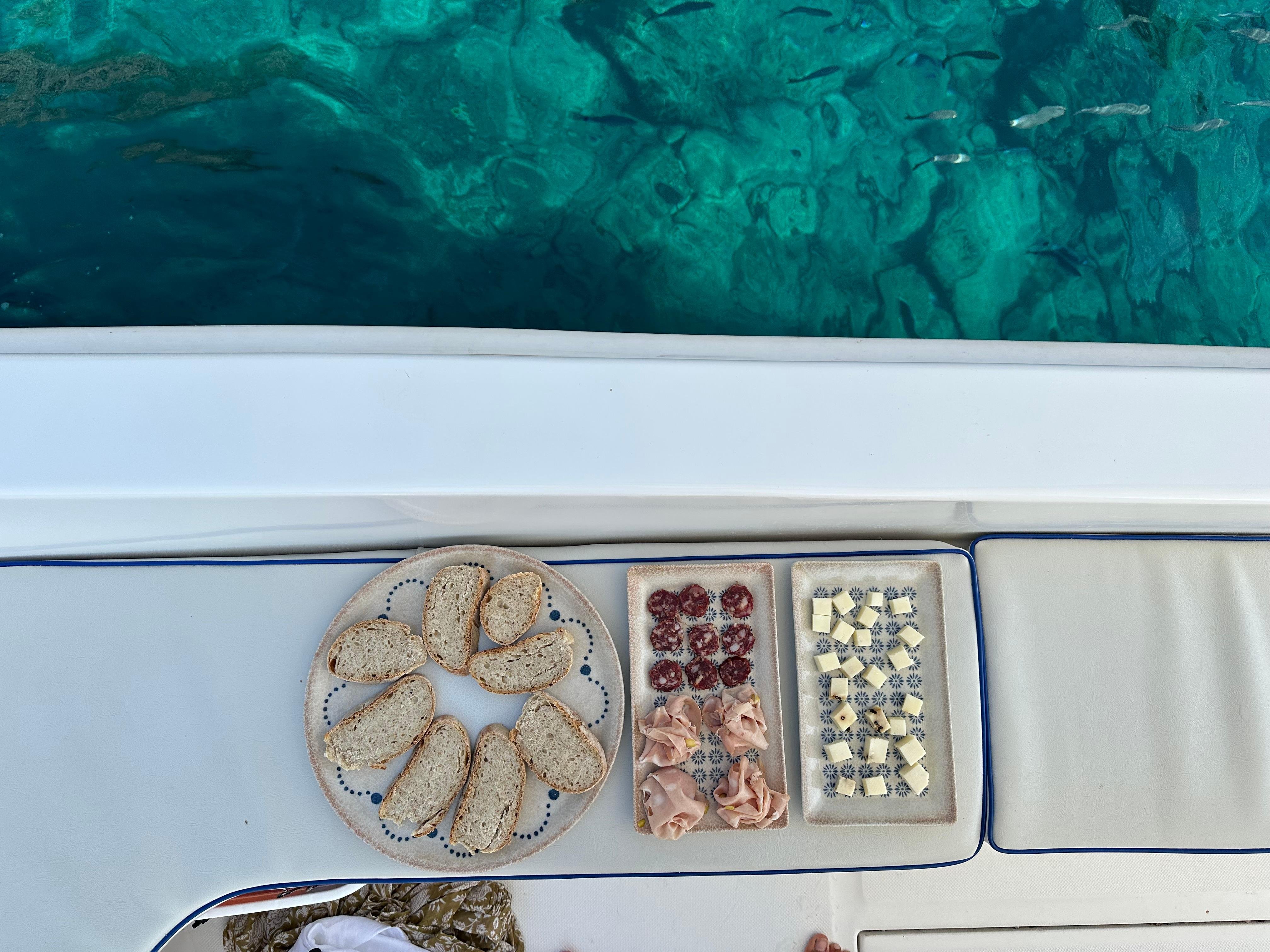 Taormina Coast Boat Cruise with Sicilian Wine & Snorkeling