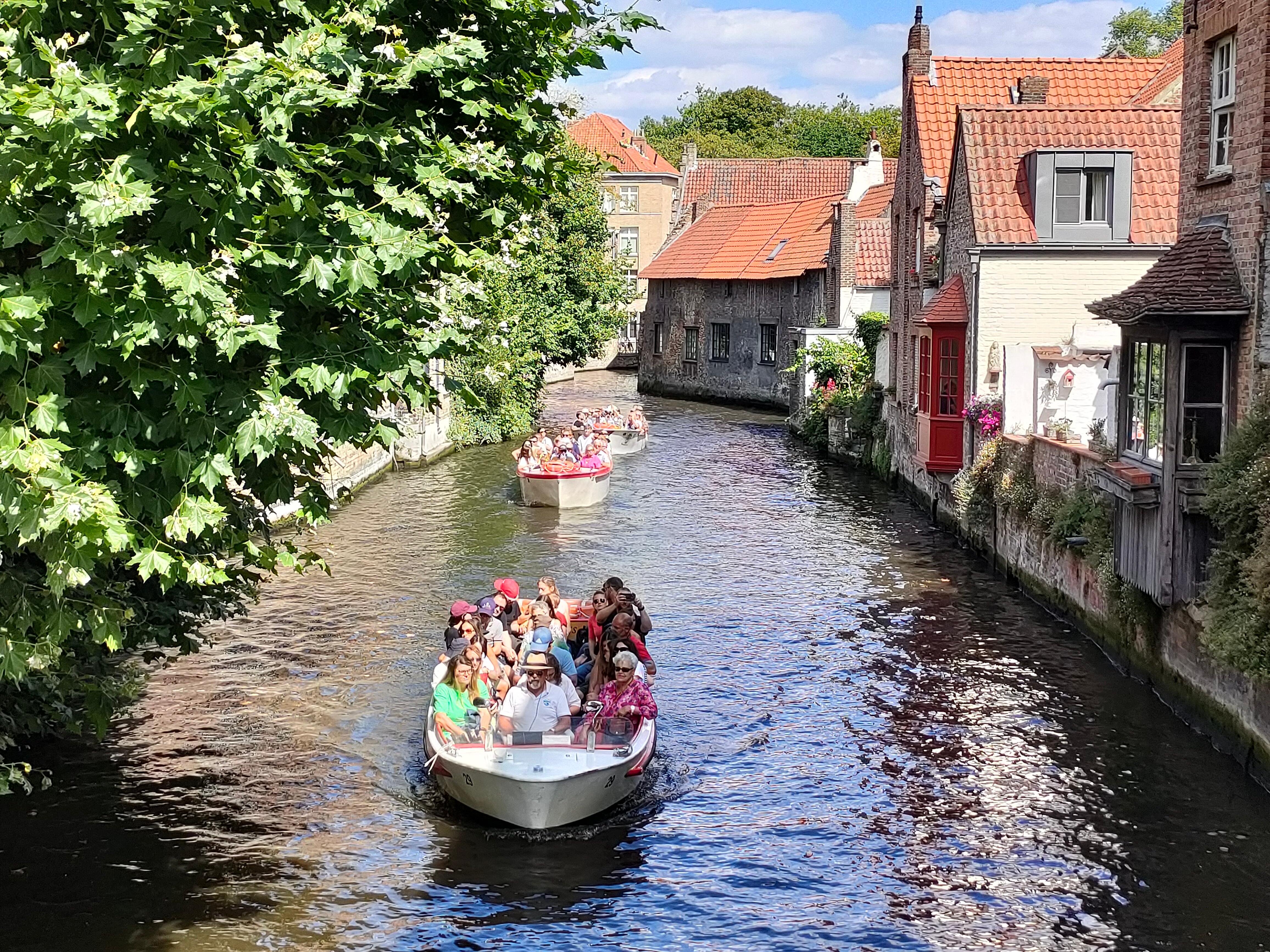 Bruges canal boat tour — medieval canals, low bridges, the Belfry and the Beguinage in the Venice of the North — image 13