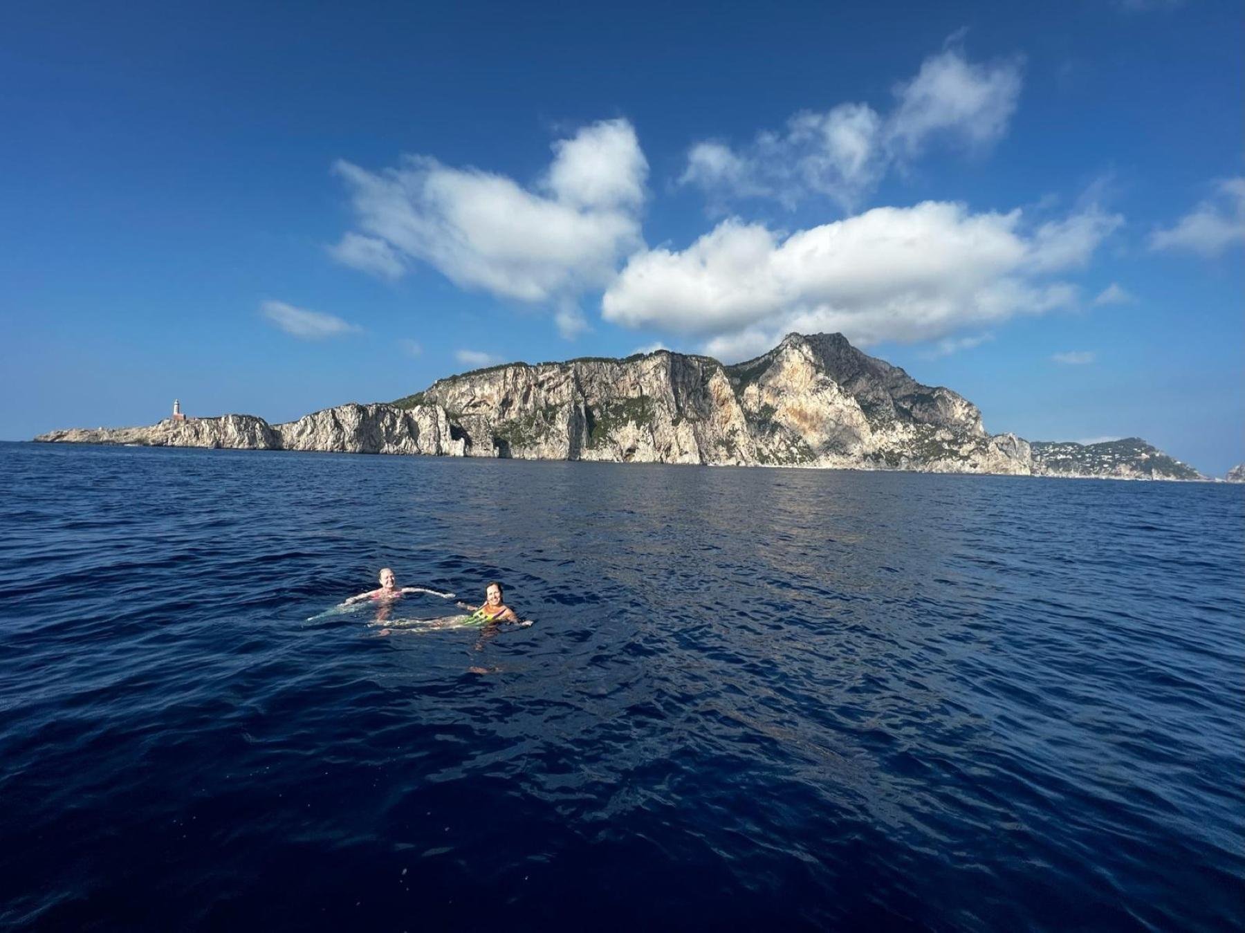 Capri Private Boat Tour: Faraglioni, Sea Caves & Swimming Stops