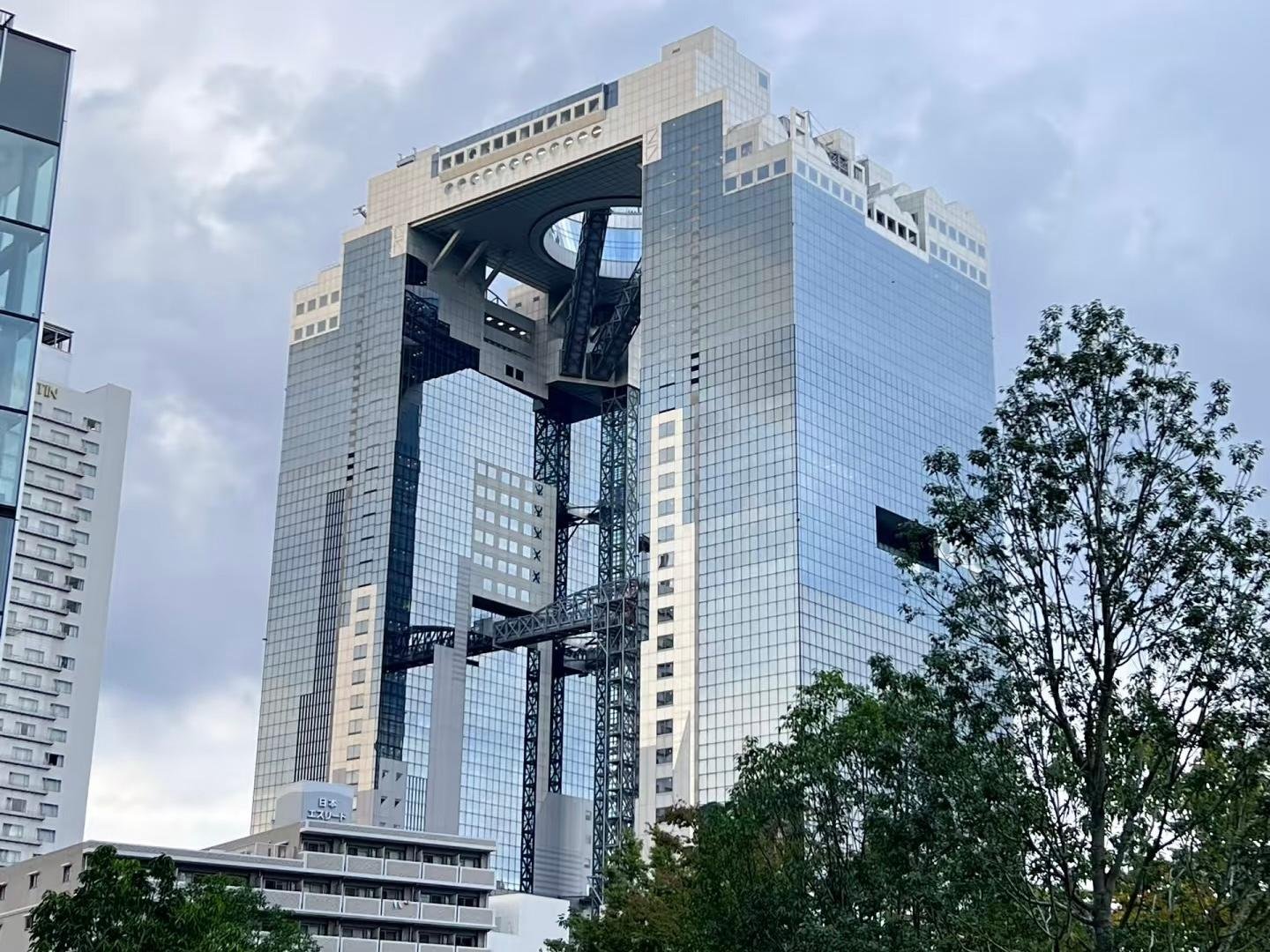 Umeda Sky Building: Osaka Skyline & City Stories