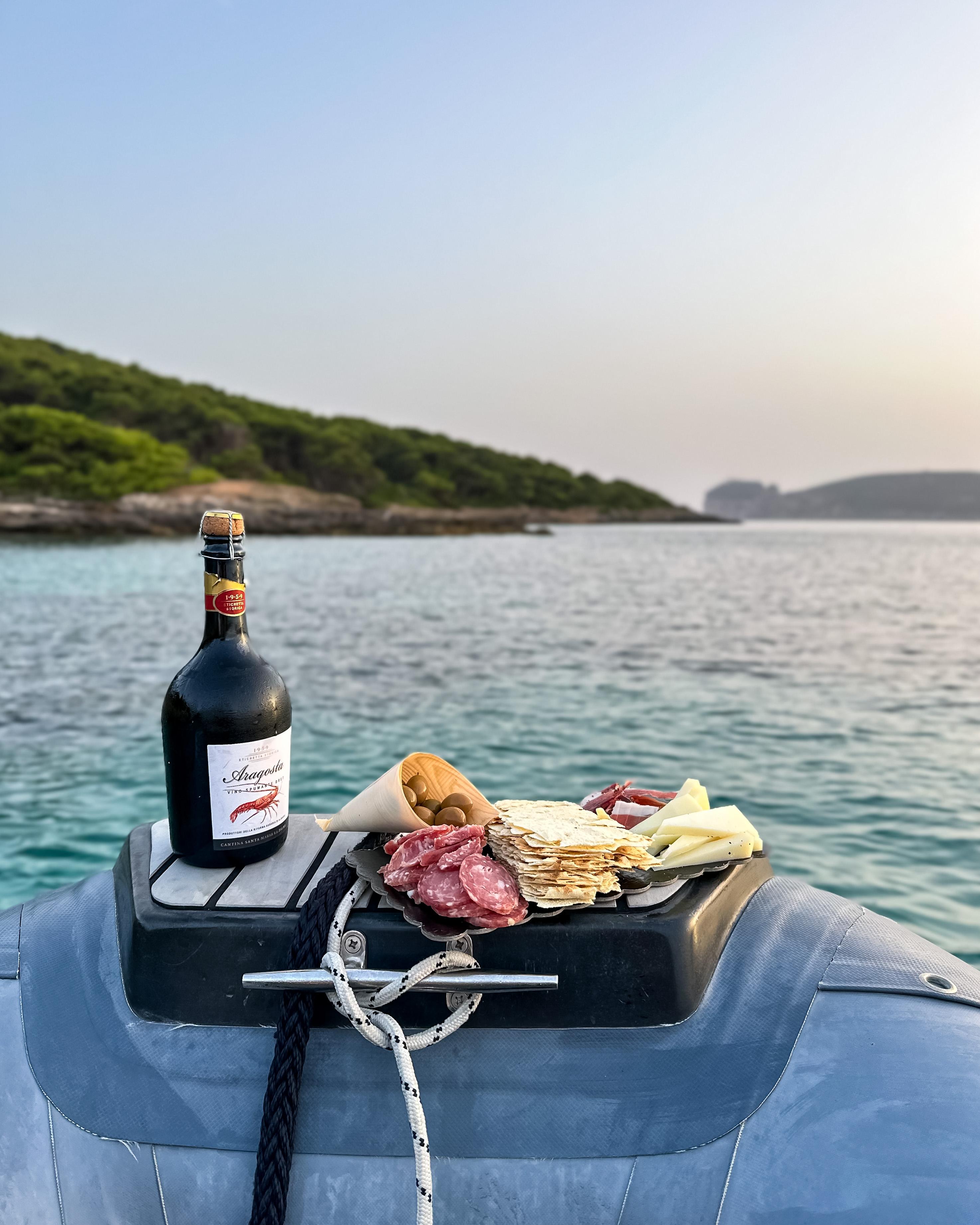 Alghero: Porto Conte Sunset Boat Cruise with Sardinian Aperitif