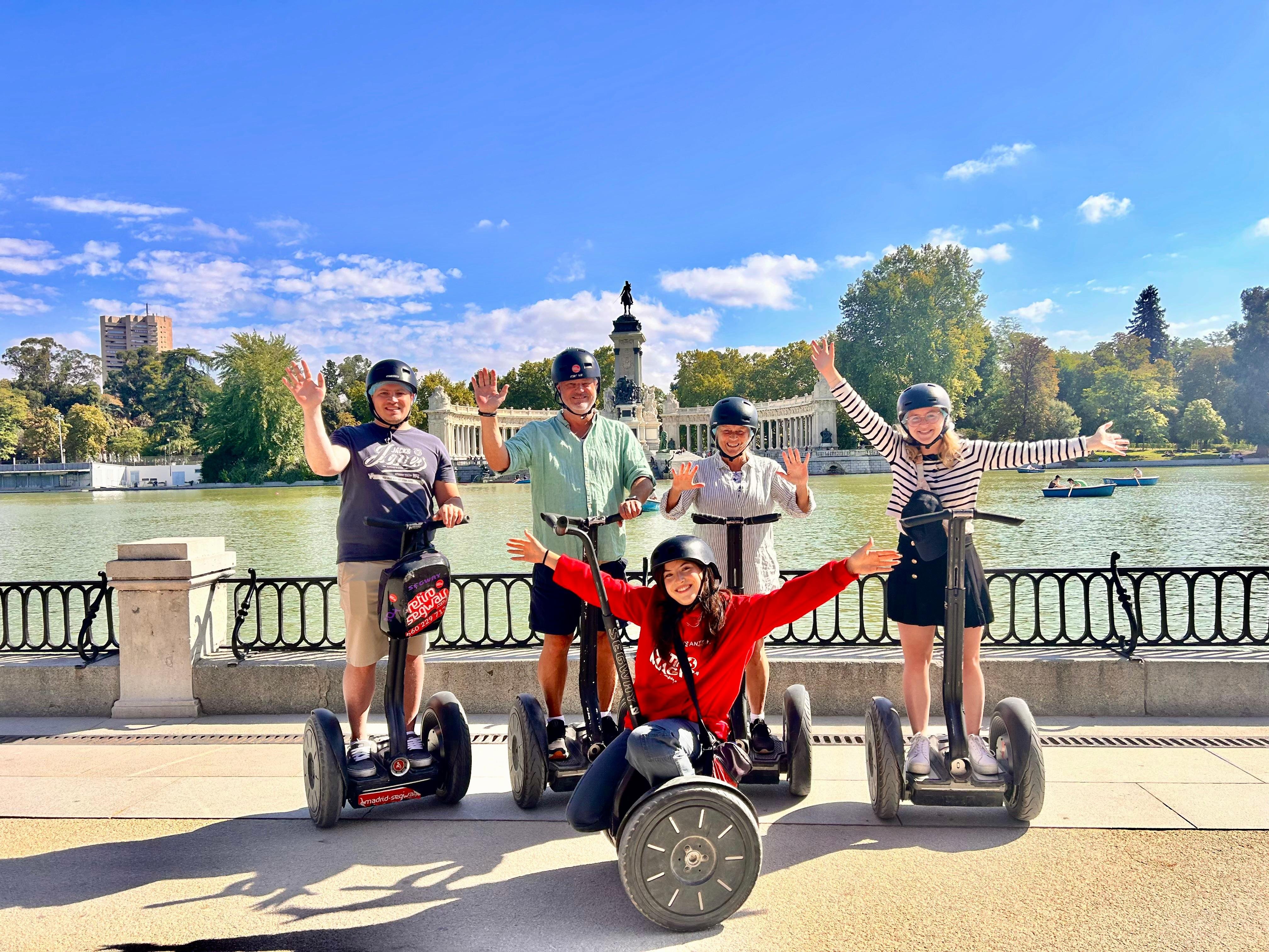Madrid segway tour rider near the Fountain of the Fallen Angel in Retiro Park — Europe's only public monument to Lucifer