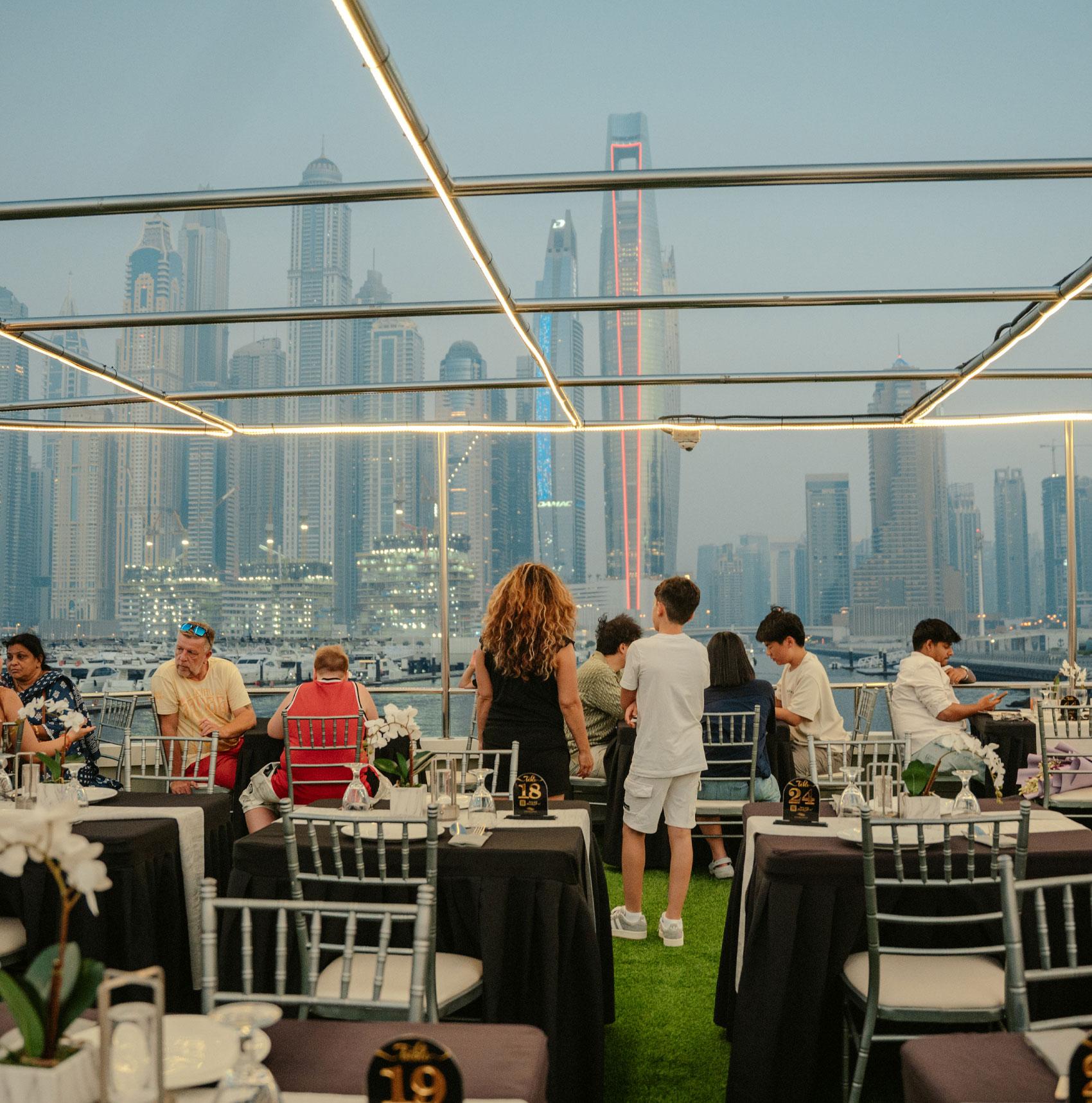 Dubai Marina Sunset & Dinner Cruise with Live Music & Open Bar