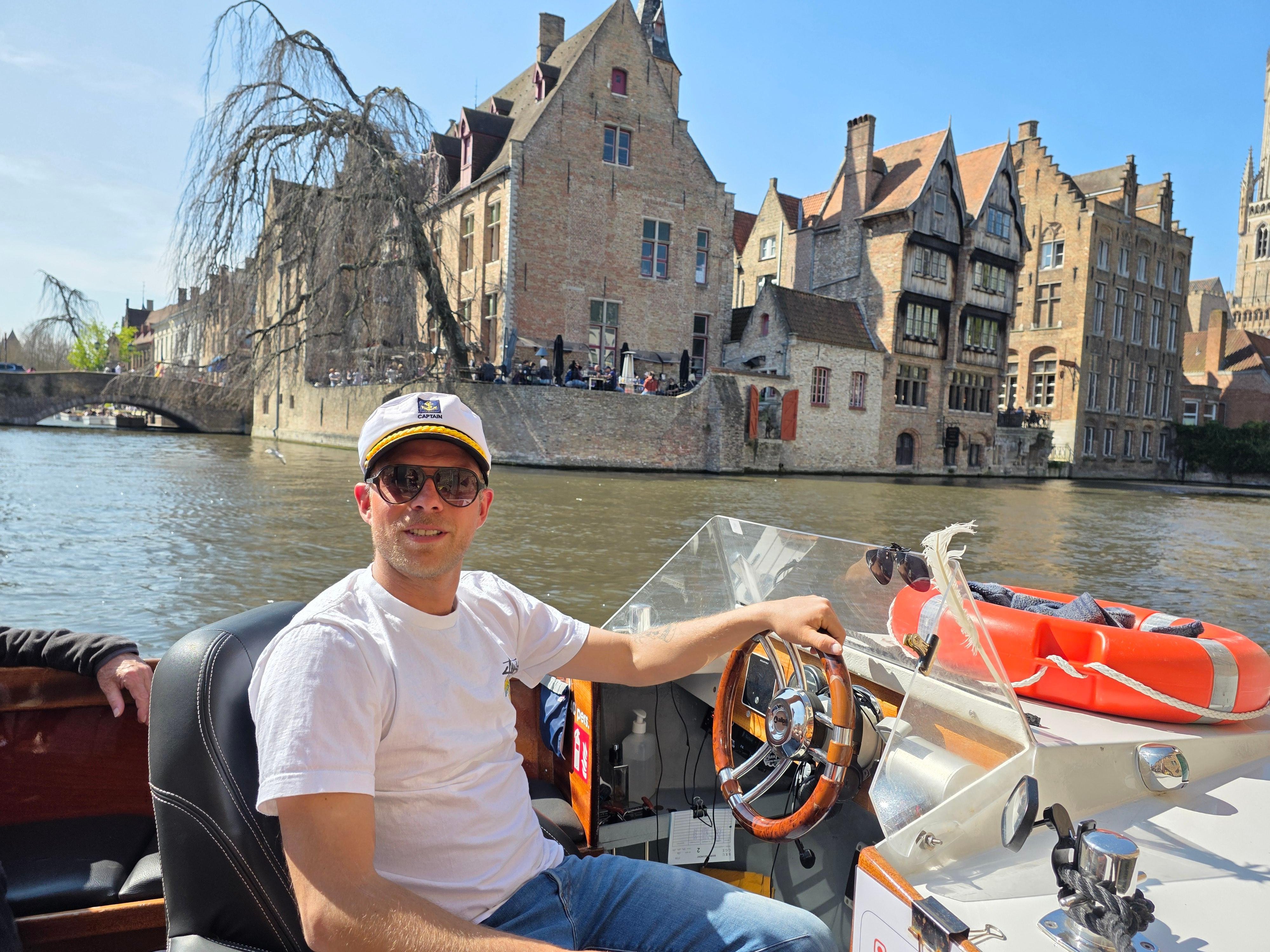 Bruges canal boat tour — medieval canals, low bridges, the Belfry and the Beguinage in the Venice of the North — image 26
