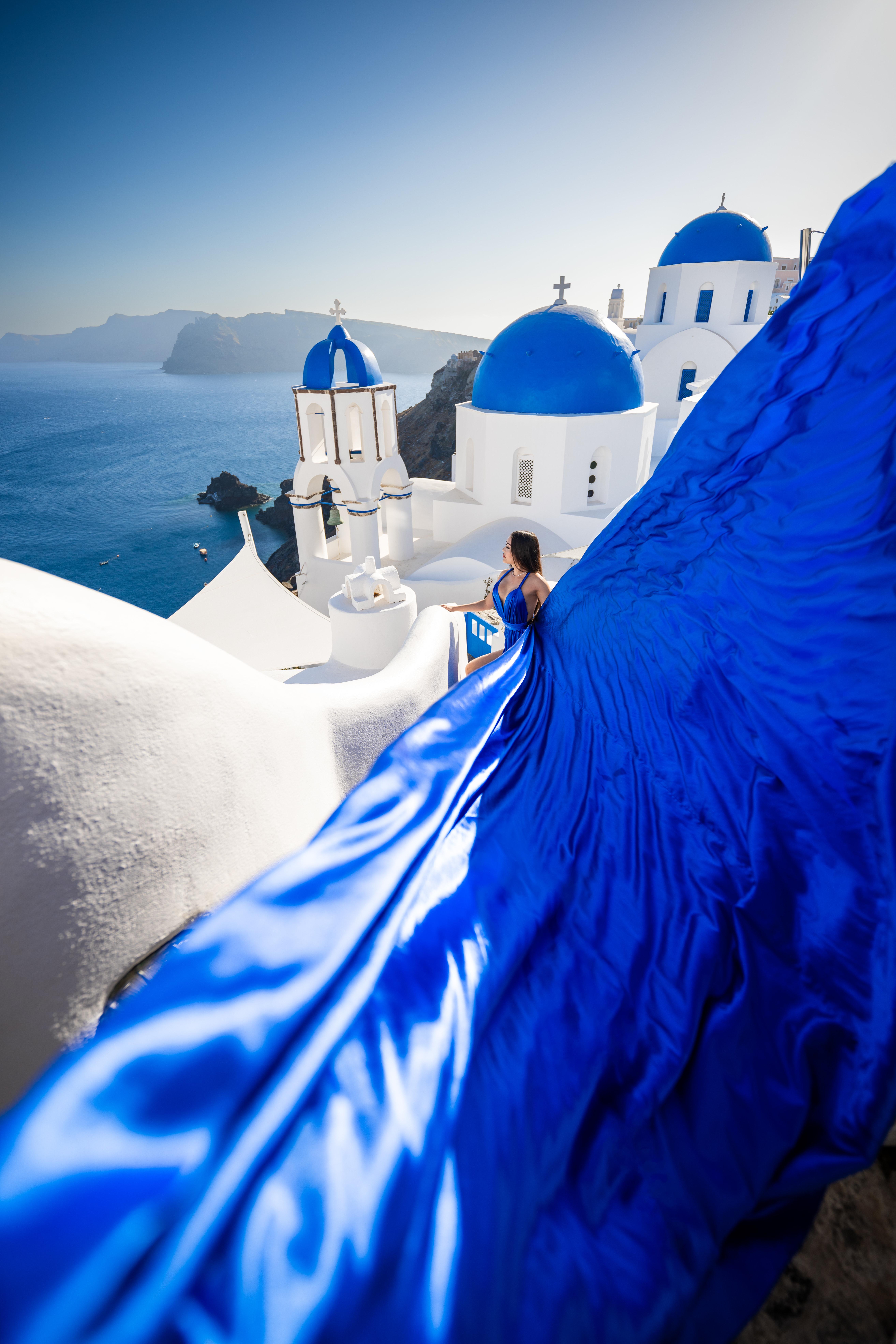 Oia Flying Dress Photoshoot at Blue Domes