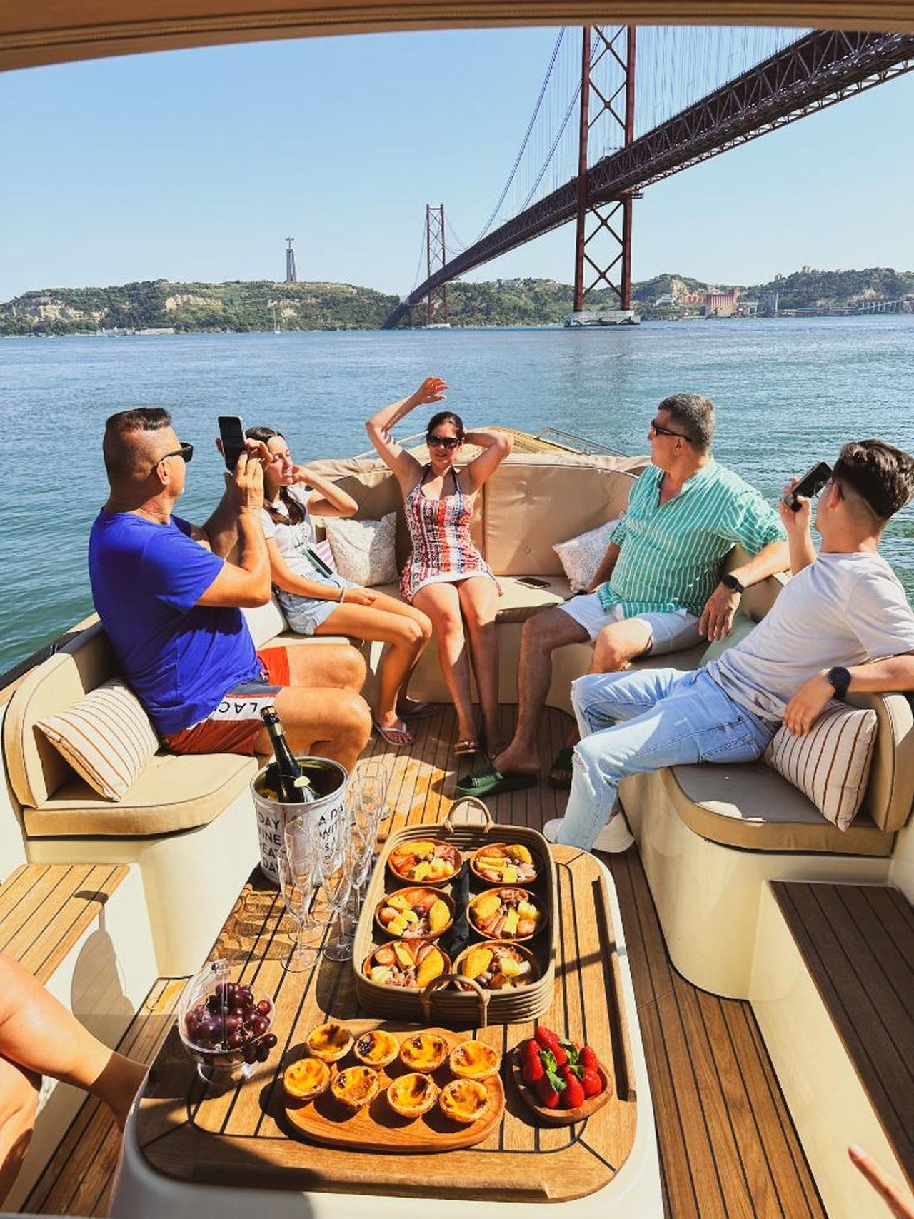 Lisbon Sunset Boat Cruise with Open Bar & Pizza