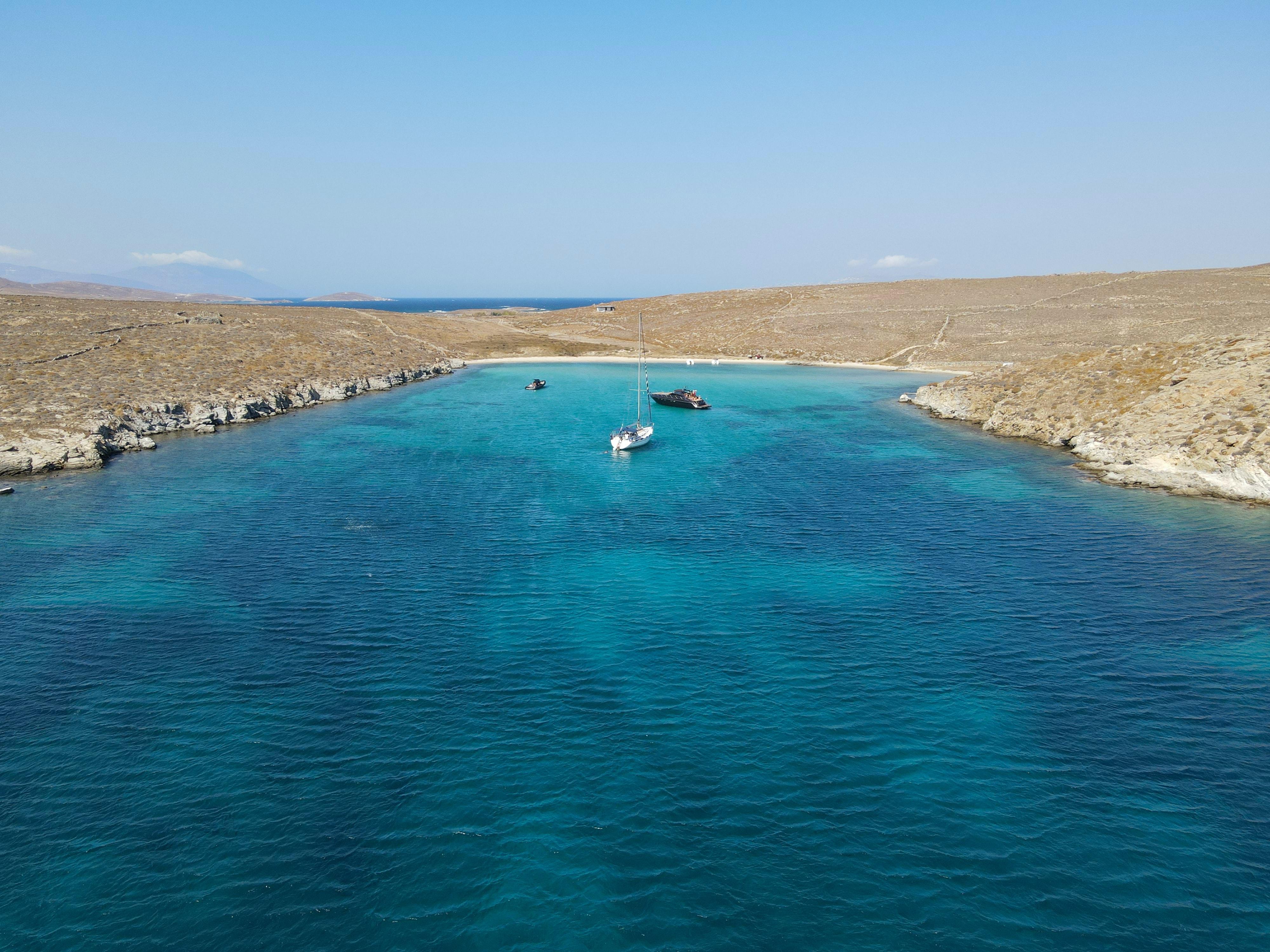 Mykonos Island Hopping: Delos Ruins & Rhenia Beach BBQ