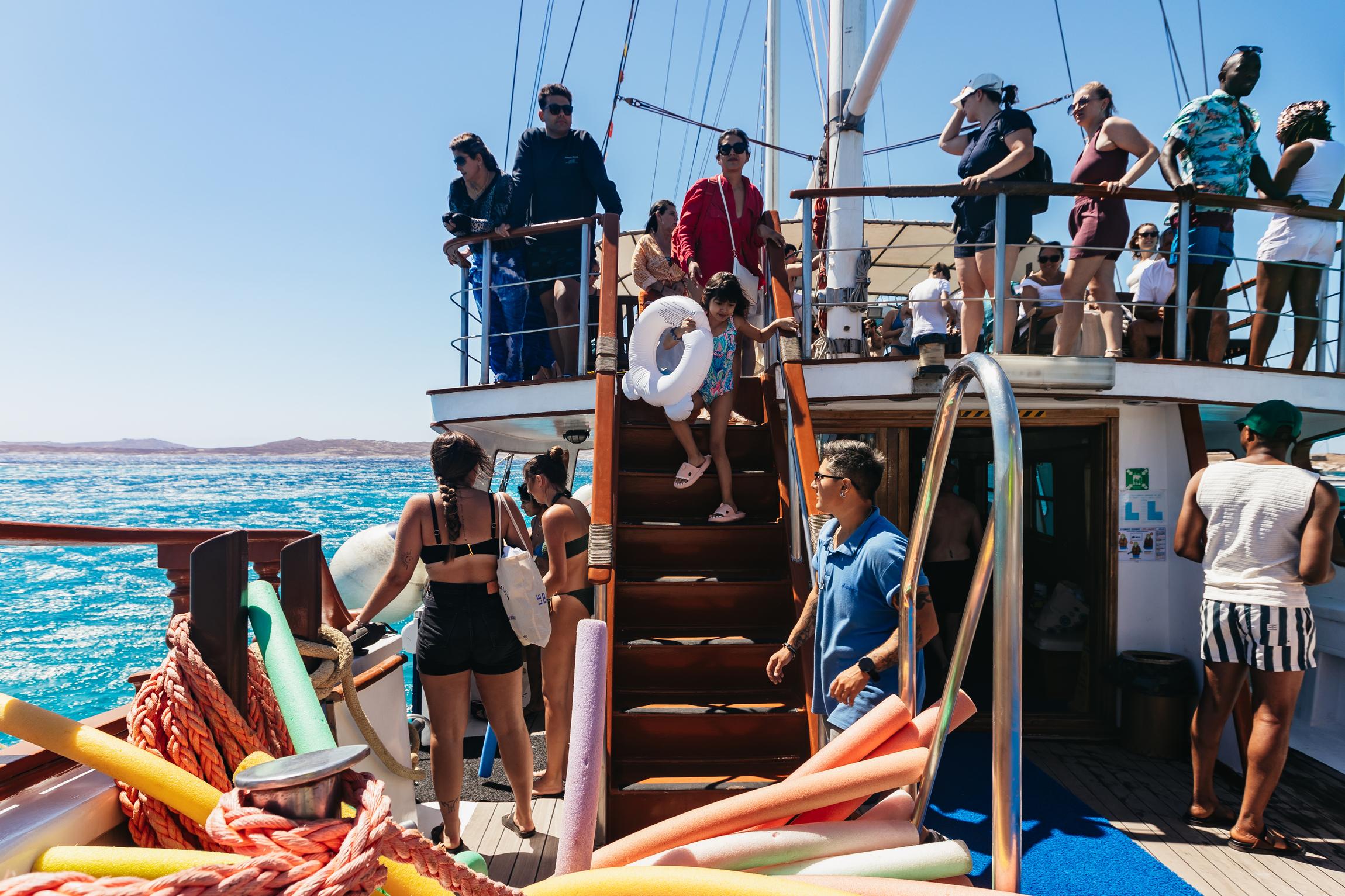 Mykonos Island Hopping: Delos Ruins & Rhenia Beach BBQ