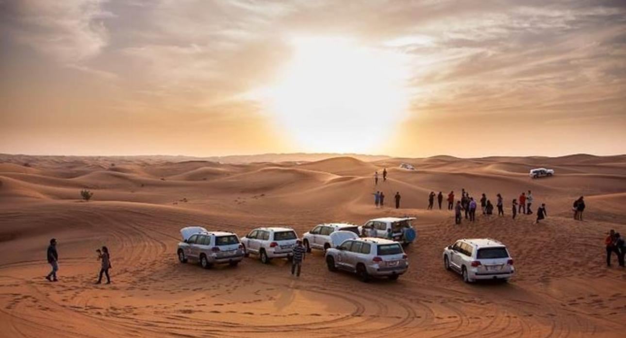 Doha Desert Safari: Sunset Dune Bashing, Camel Ride & Sandboarding