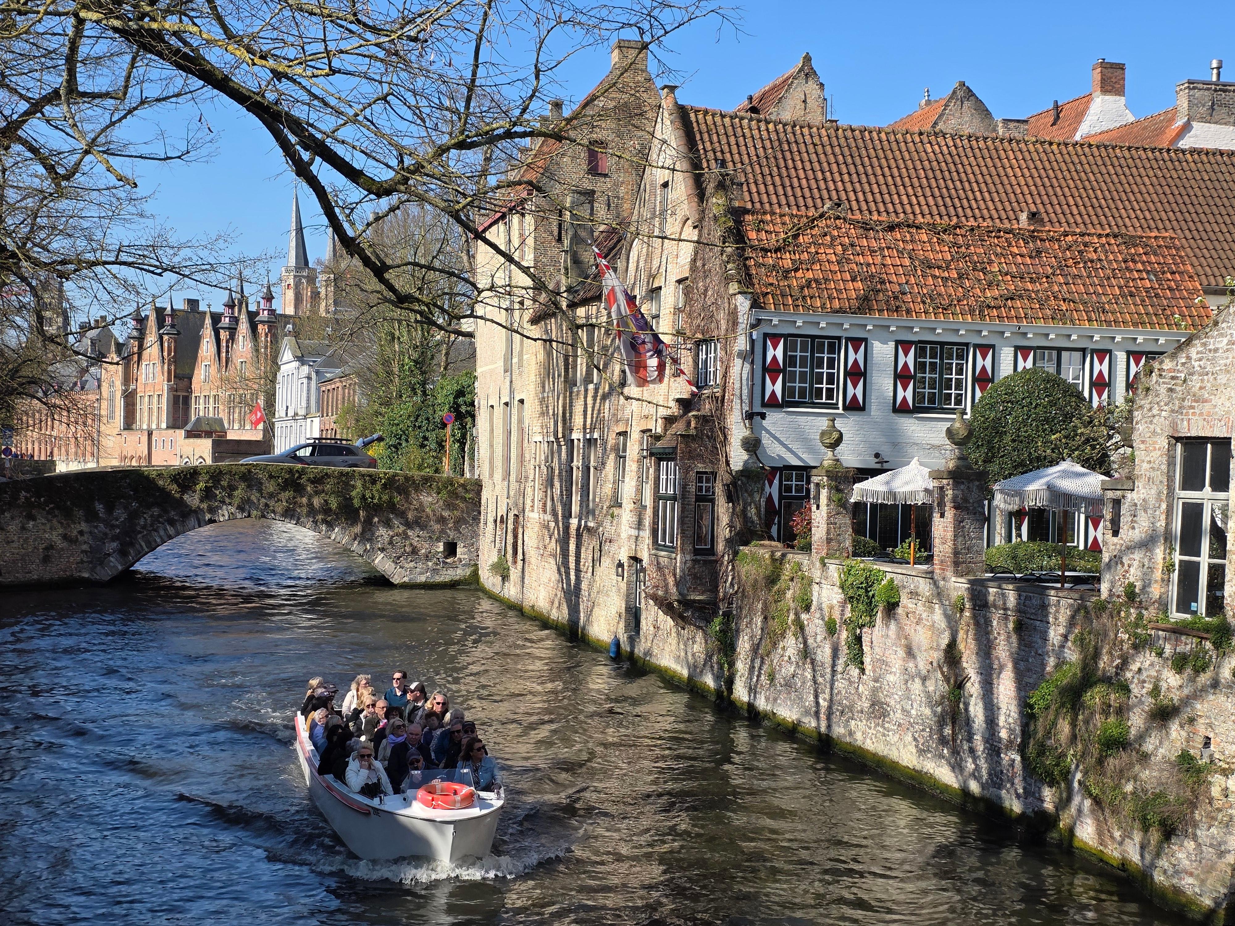 Bruges canal boat tour — medieval canals, low bridges, the Belfry and the Beguinage in the Venice of the North — image 39