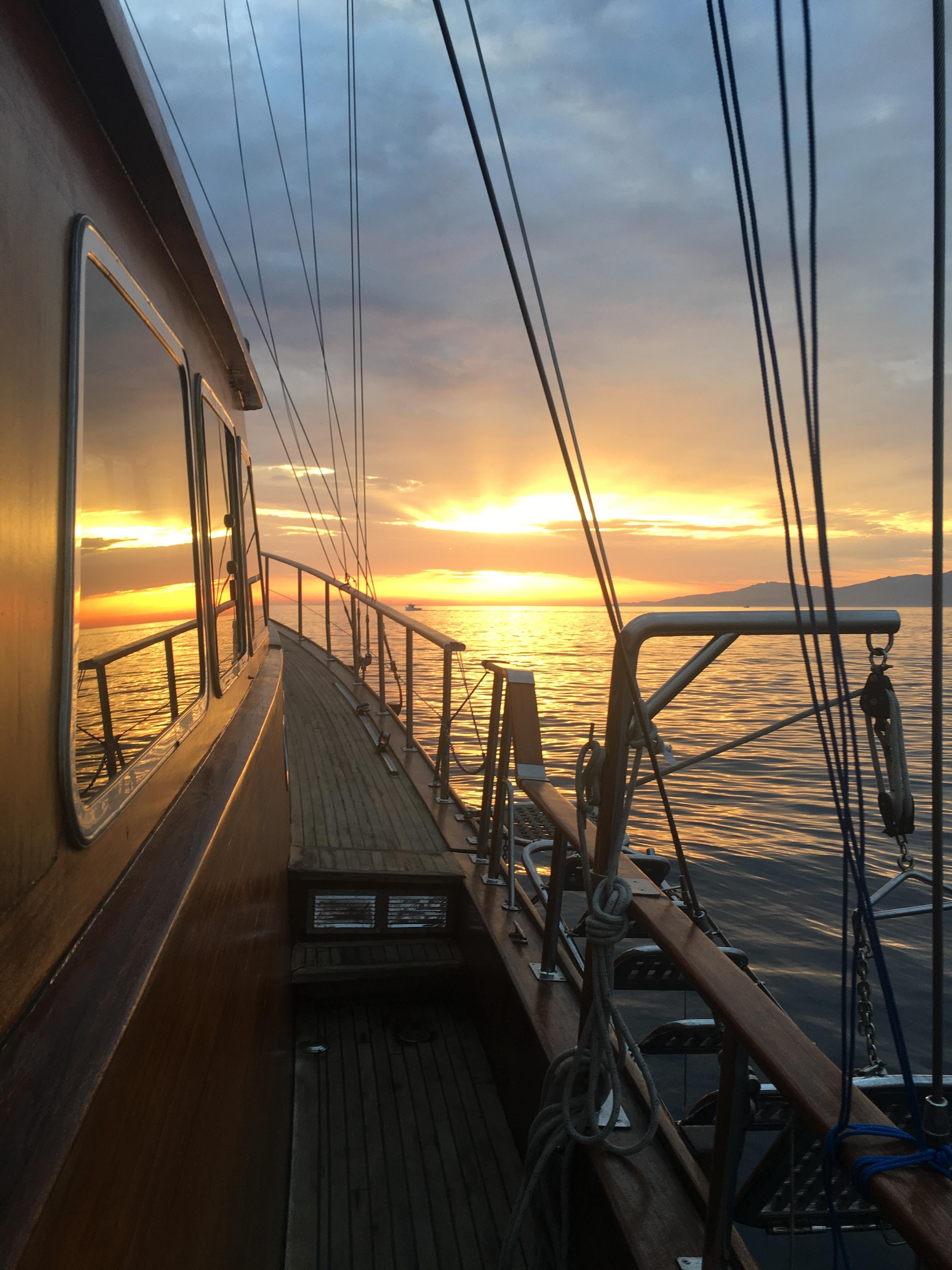 Mykonos Sunset Coastal Cruise with Dinner & Drinks