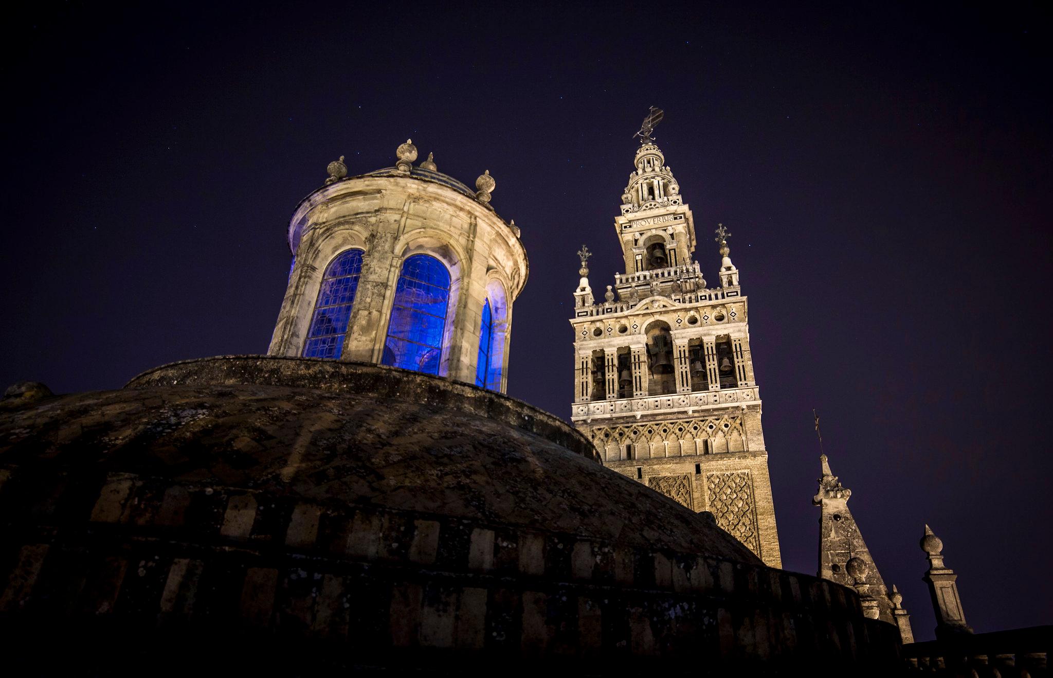 Seville Nocturnal Discovery: Historic Center & Riverside Walk