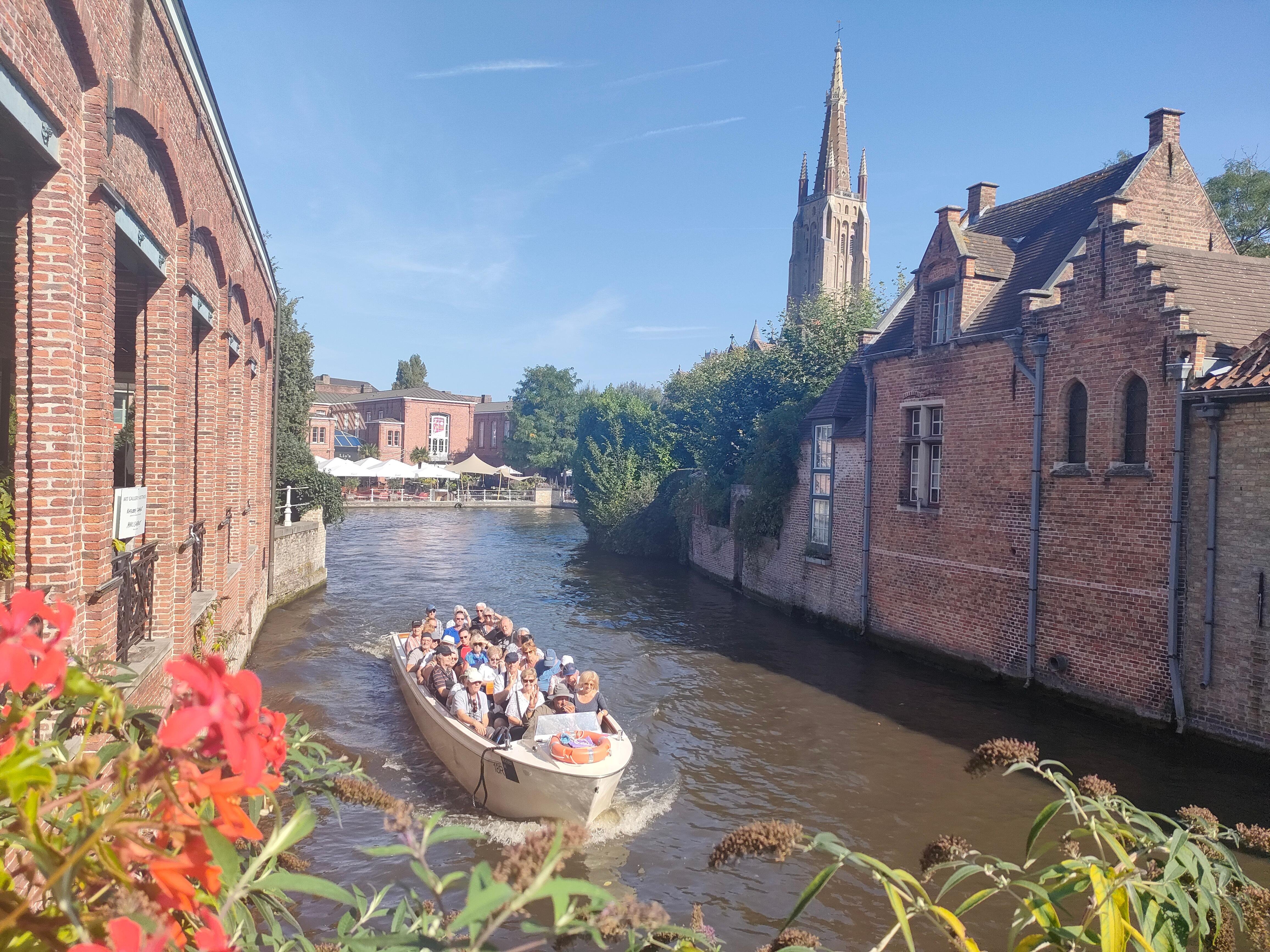 Bruges canal boat tour — medieval canals, low bridges, the Belfry and the Beguinage in the Venice of the North — image 21