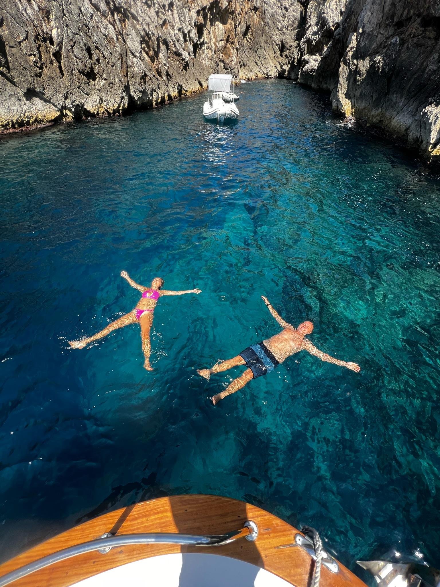 Capri Private Boat Tour: Faraglioni, Sea Caves & Swimming Stops
