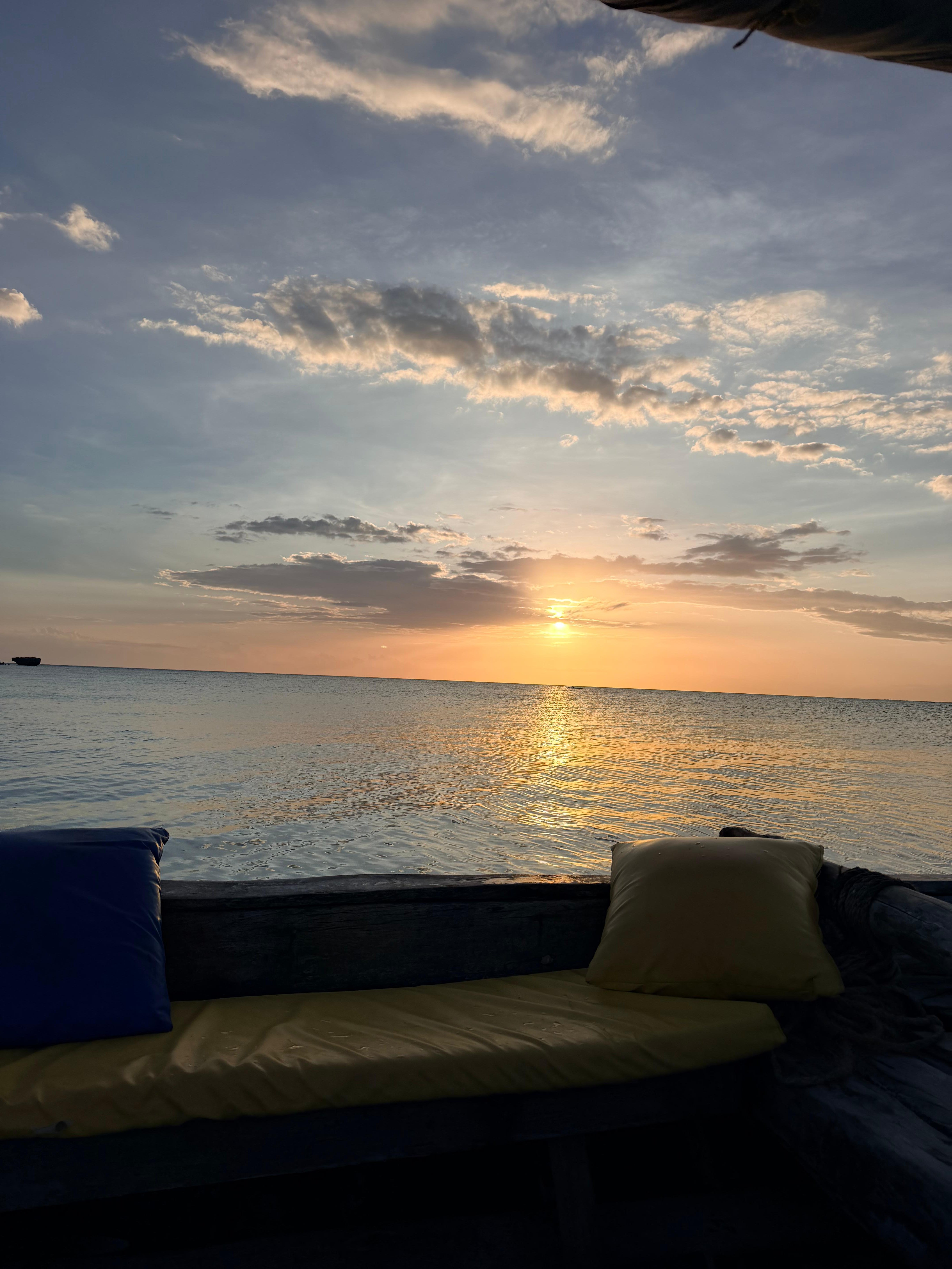 Zanzibar Sunset Dolphin Swim & Mnemba Island Snorkel Tour
