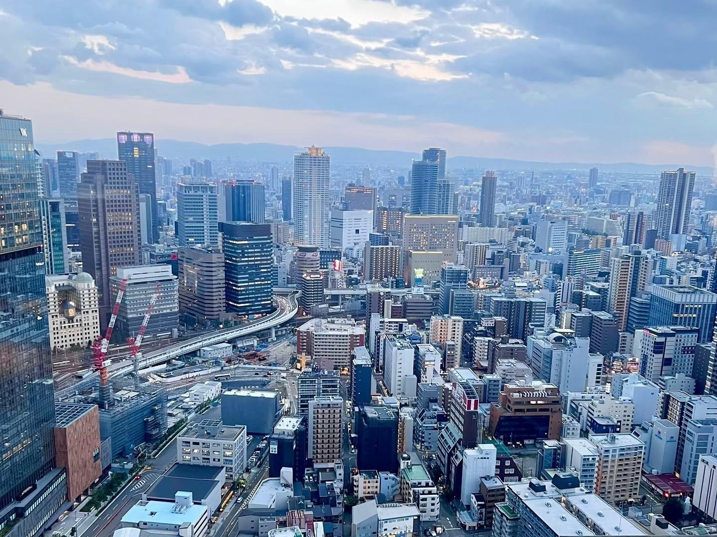 Umeda Sky Building: Osaka Skyline & City Stories