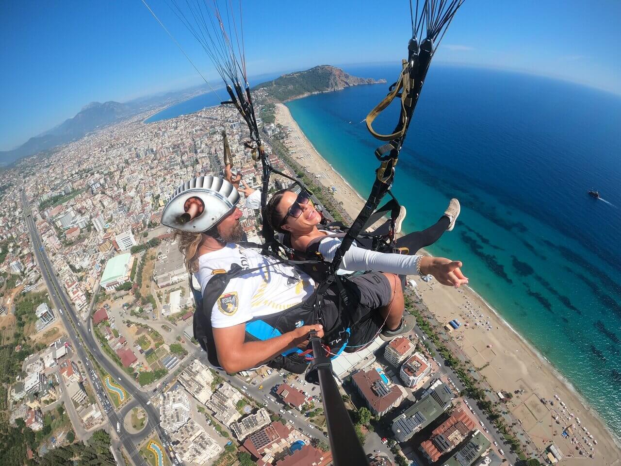 Alanya Multi-Experience: Paragliding, Heritage Tour & Coastal Cruise