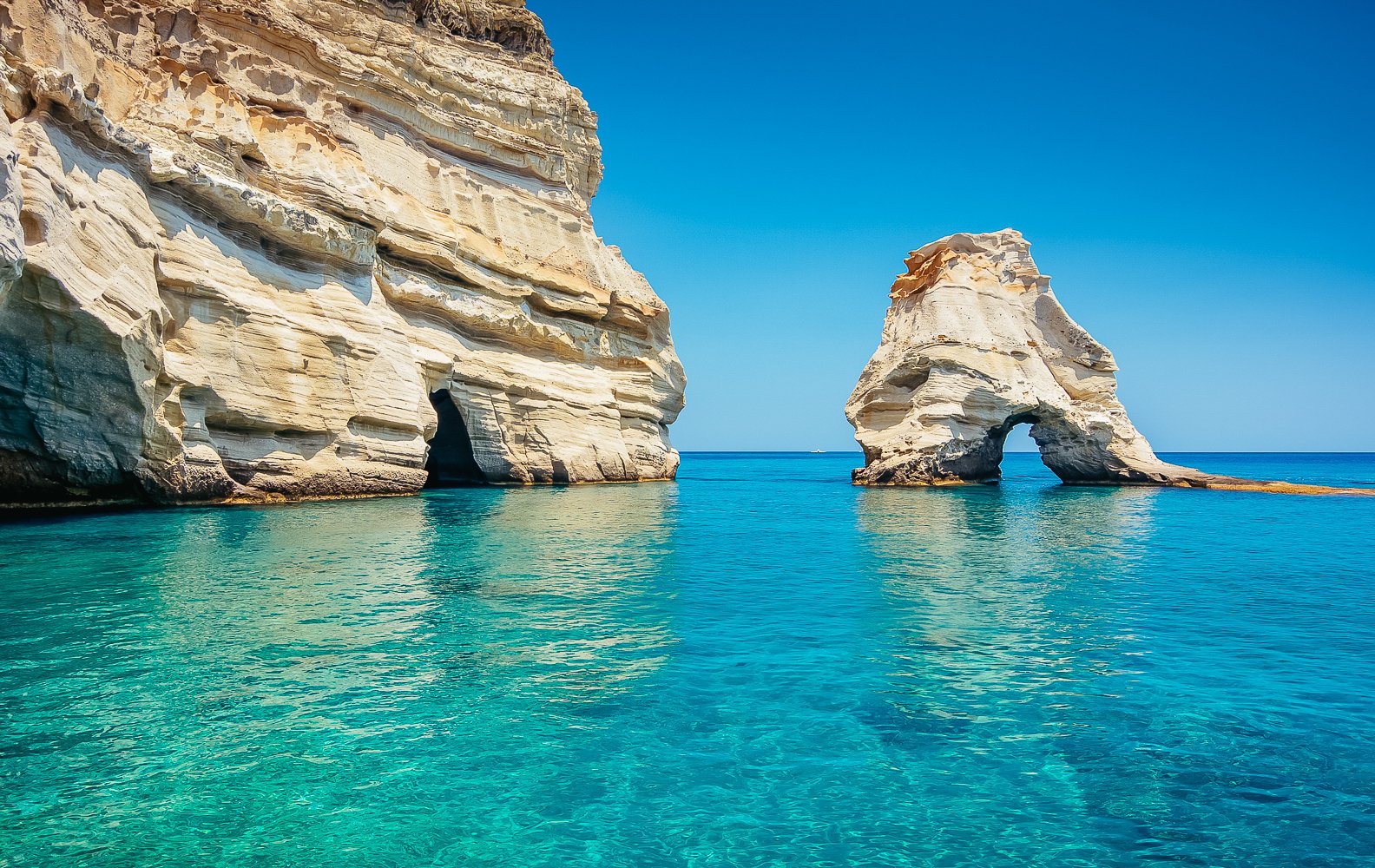 Kleftiko boat tour Milos sea caves arches sailing — image 11