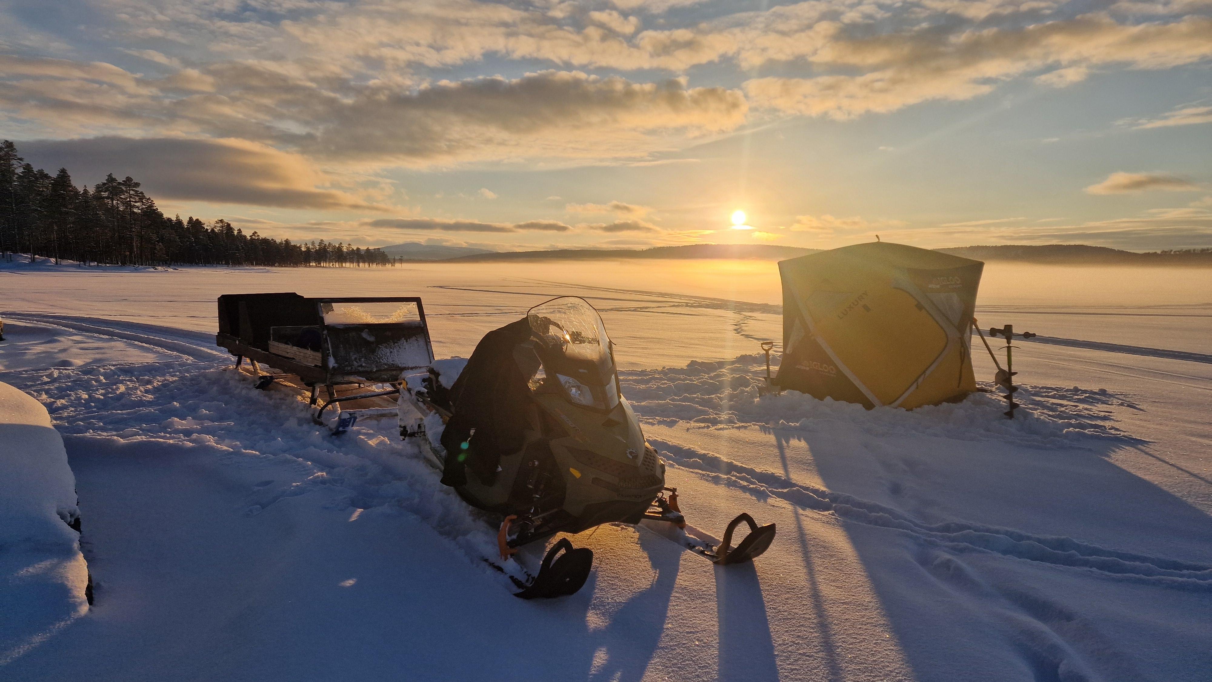 Wilderness Sleigh Expedition with Ice Fishing & Fire-Cooked Lunch