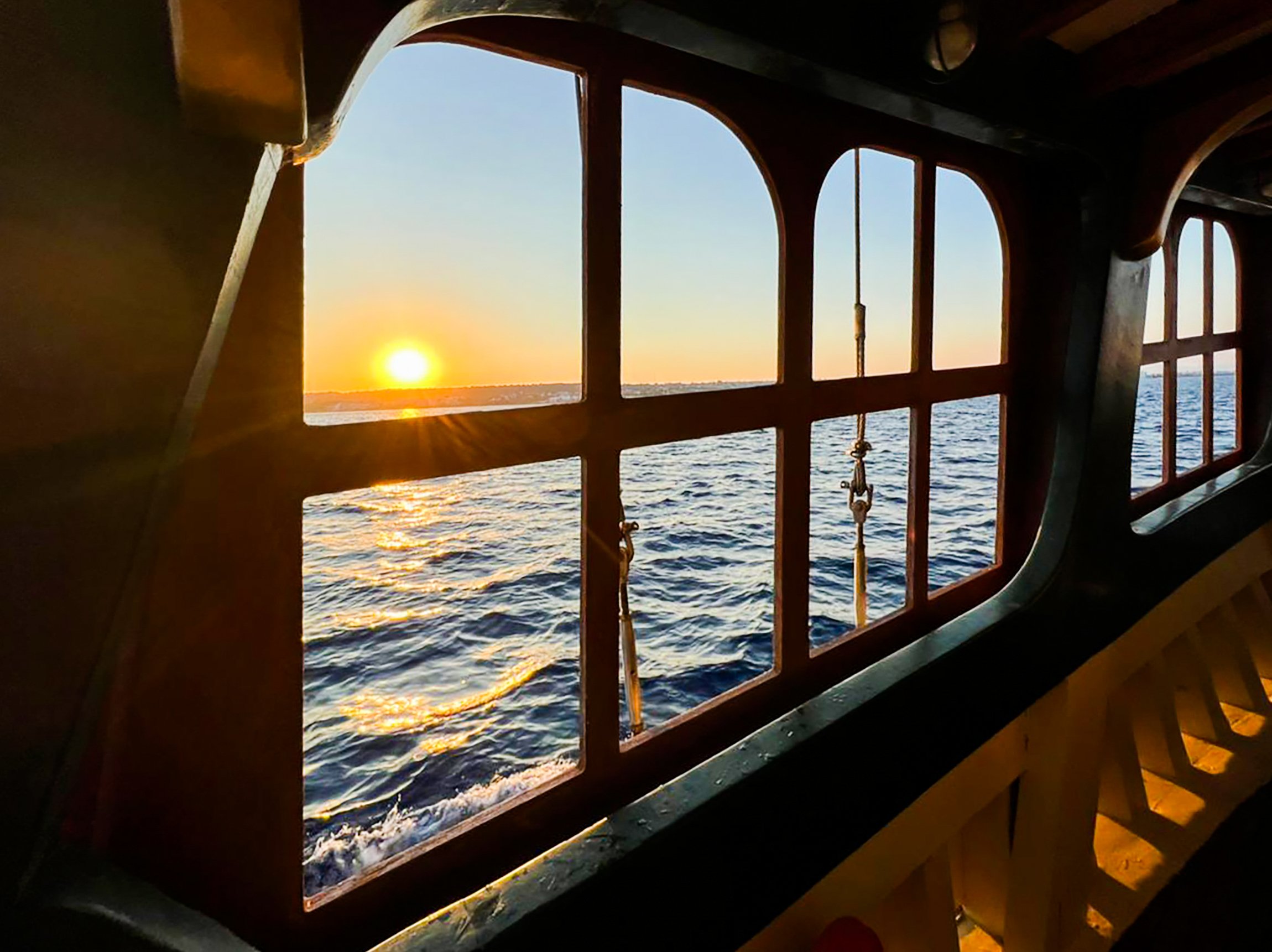 Rhodes Sunset Cruise with Greek BBQ & Unlimited Drinks