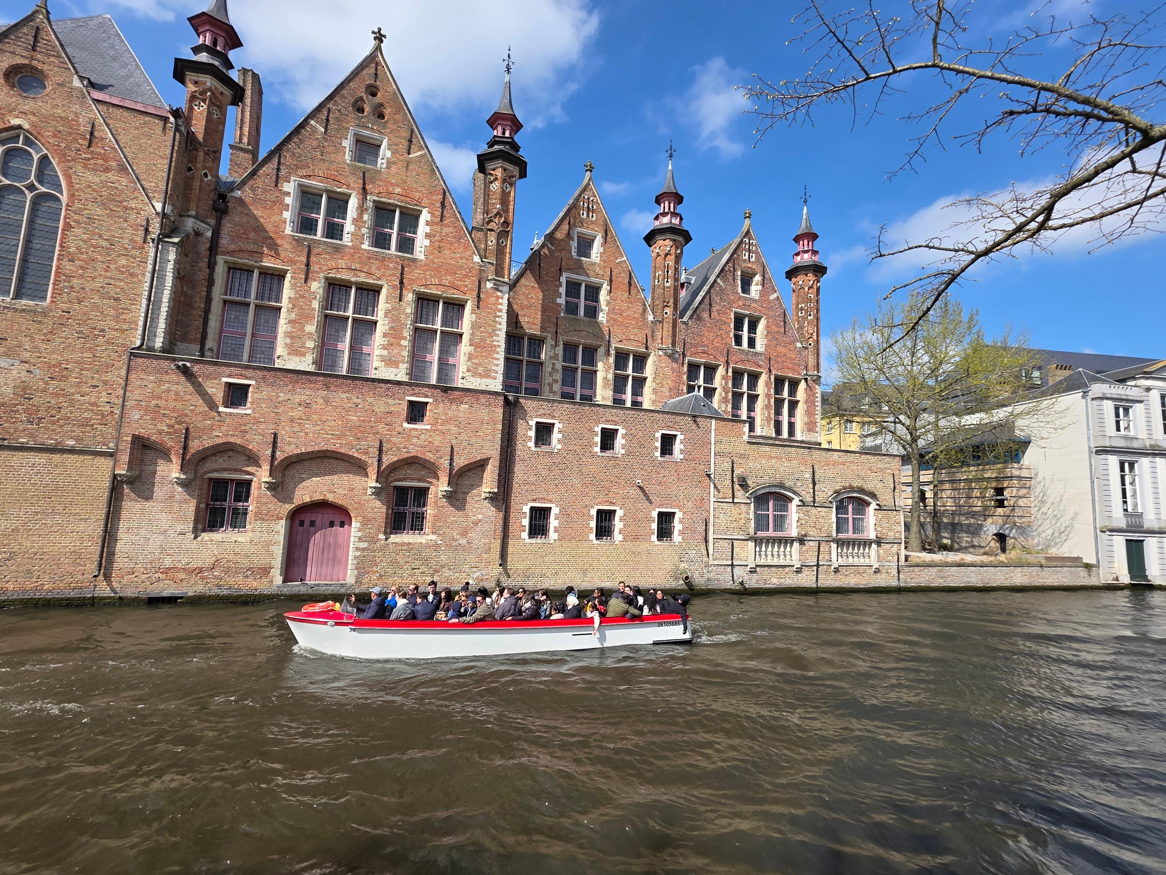 Bruges canal boat tour — medieval canals, low bridges, the Belfry and the Beguinage in the Venice of the North — image 34