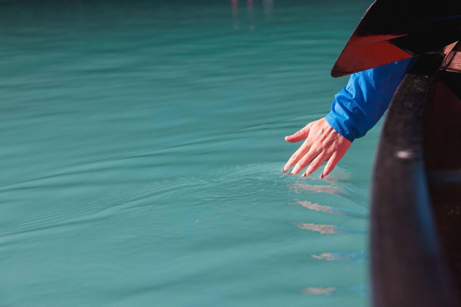 Lake Louise red canoe turquoise glacial water Victoria Glacier Banff National Park — image 7