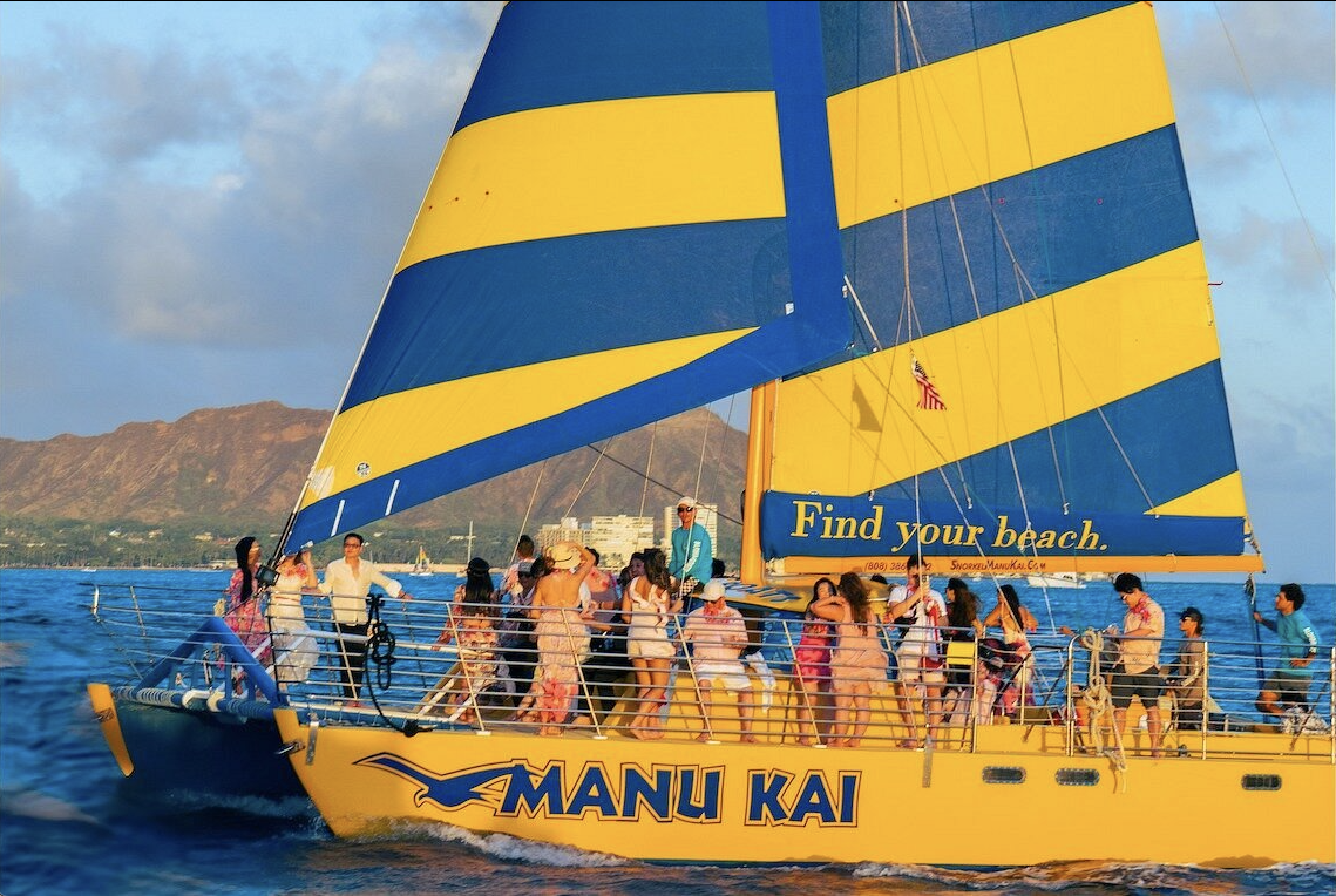 Oahu Sunset Sail on a Yellow Catamaran with Cocktails