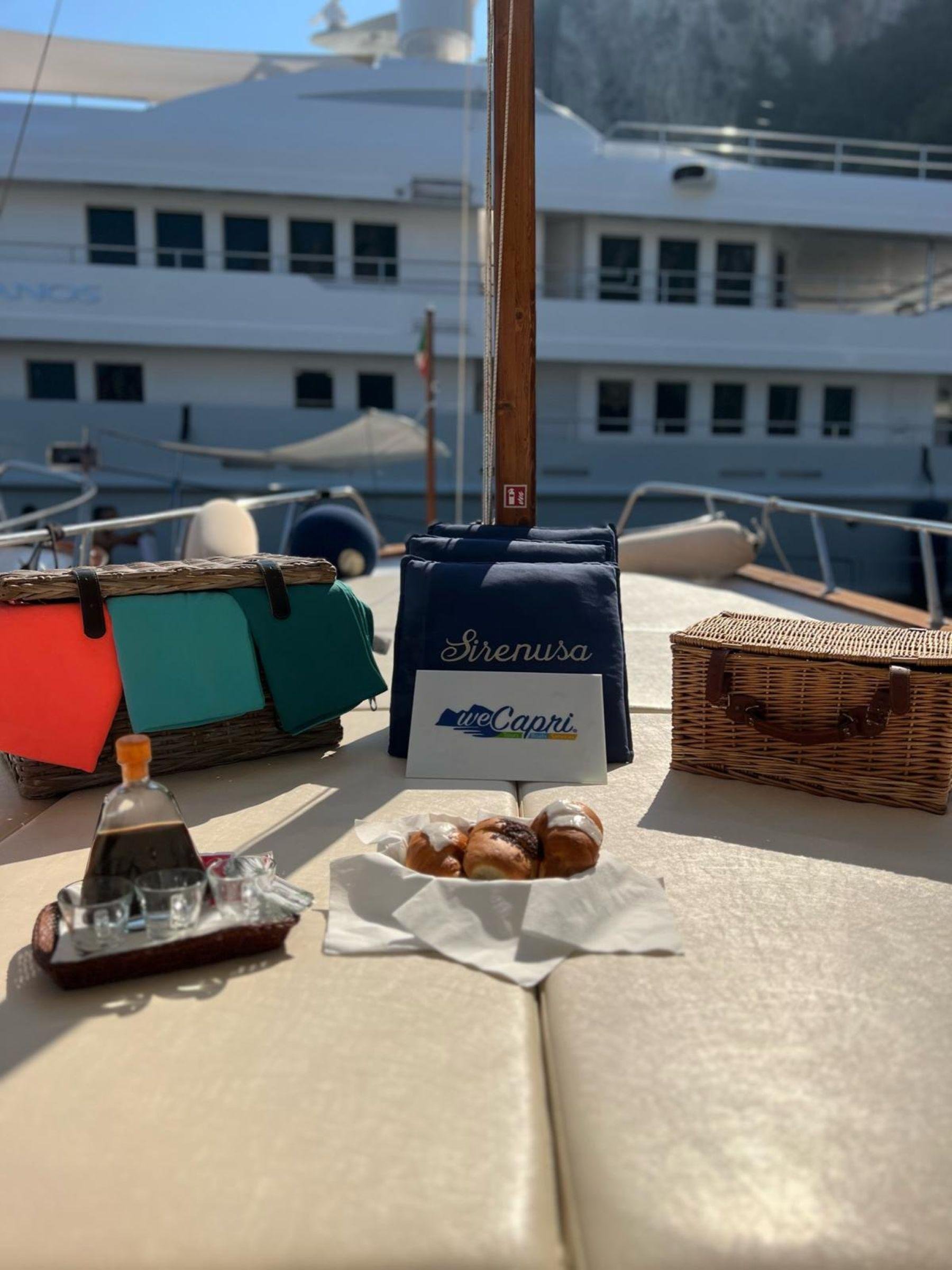 Capri Private Boat Tour: Faraglioni, Sea Caves & Swimming Stops