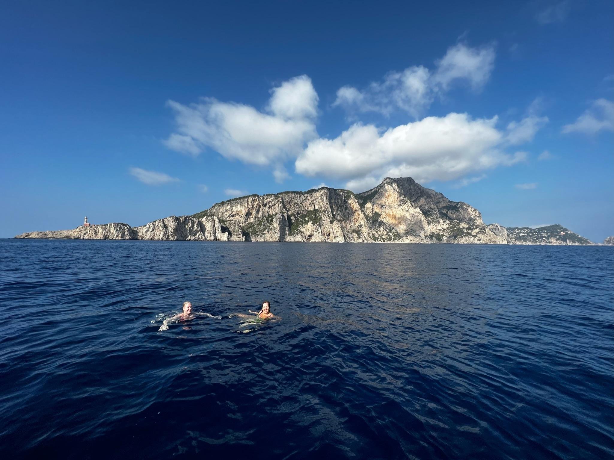 Capri Private Boat Tour: Faraglioni, Sea Caves & Swimming Stops
