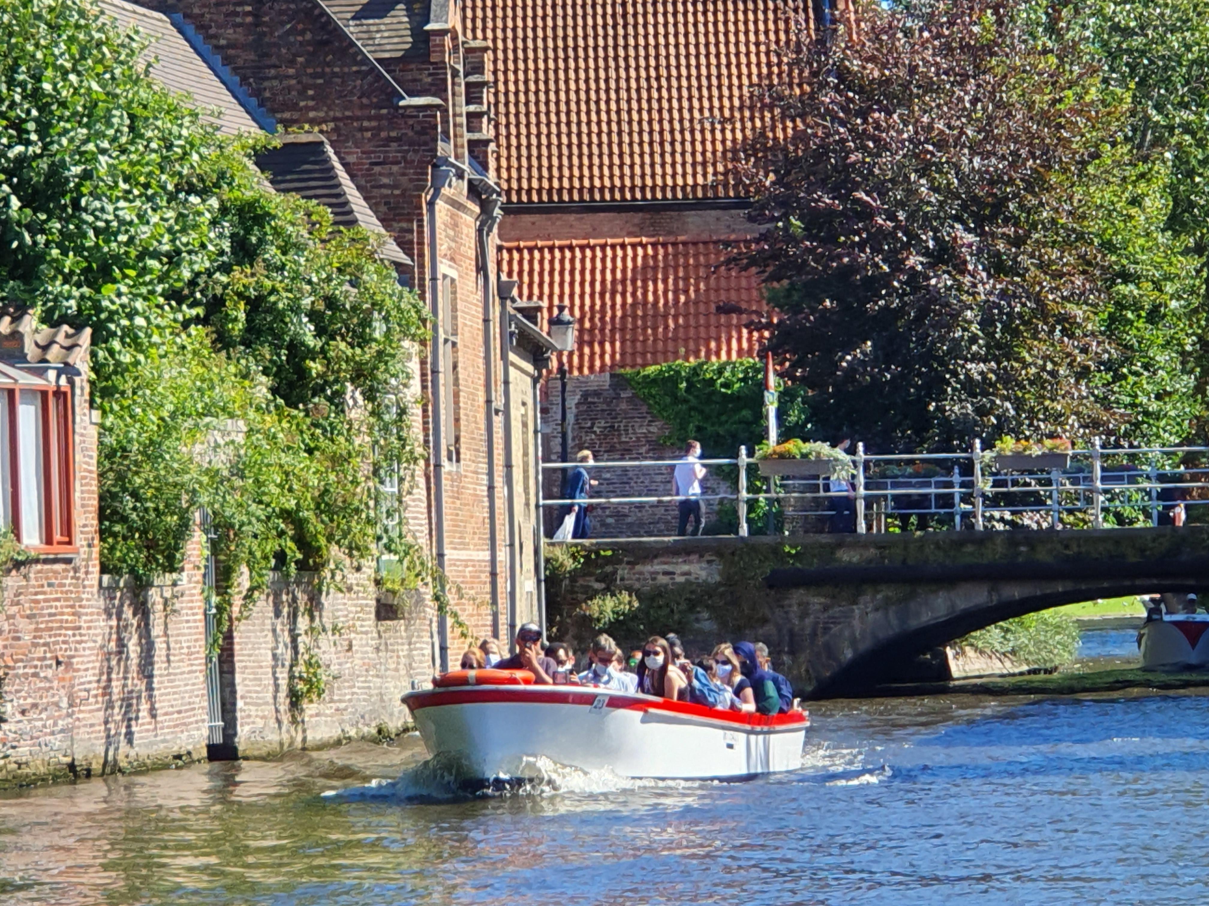 Bruges canal boat tour — medieval canals, low bridges, the Belfry and the Beguinage in the Venice of the North — image 20