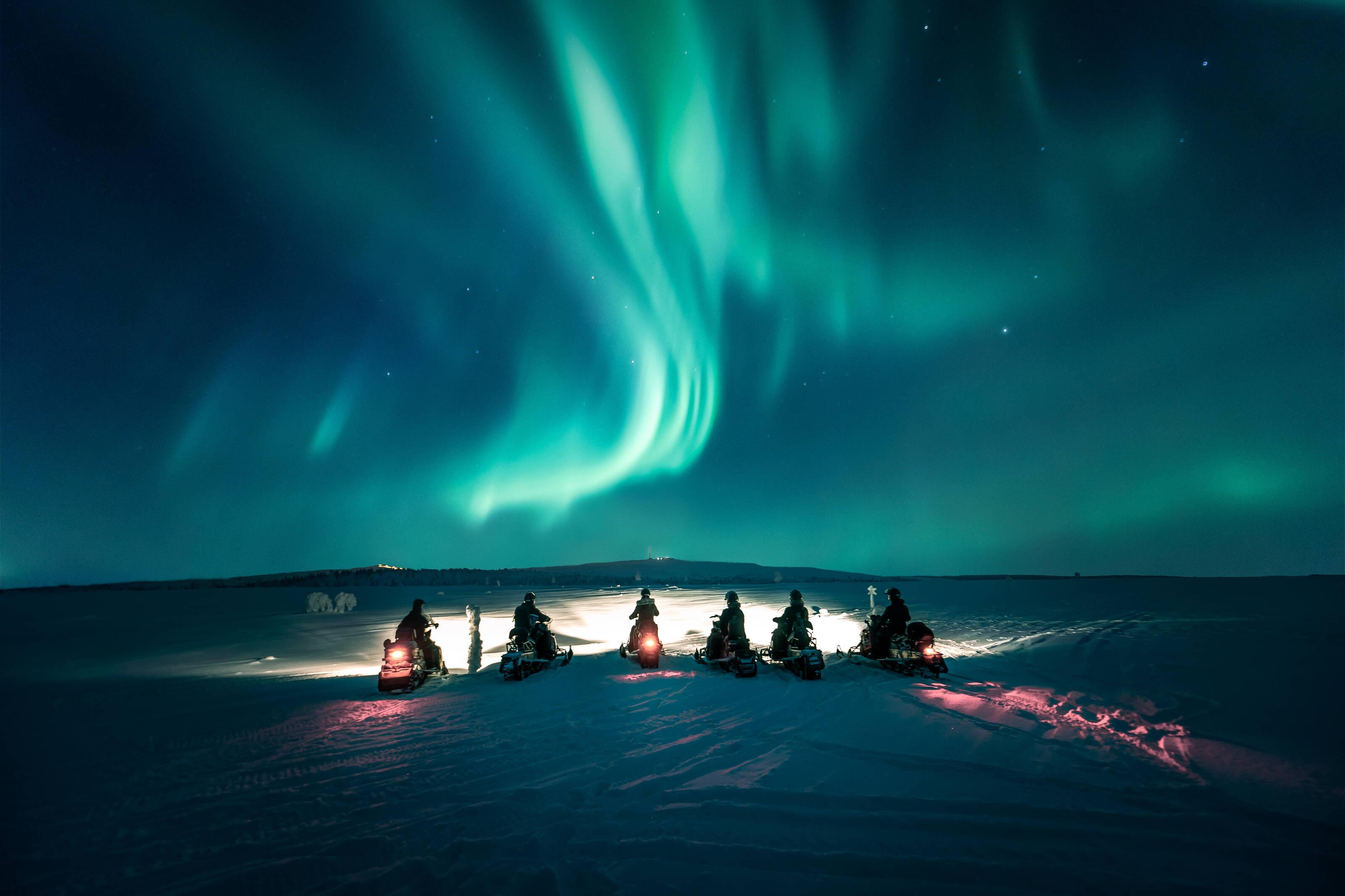 Northern Lights Snowmobile Adventure with Campfire Meal