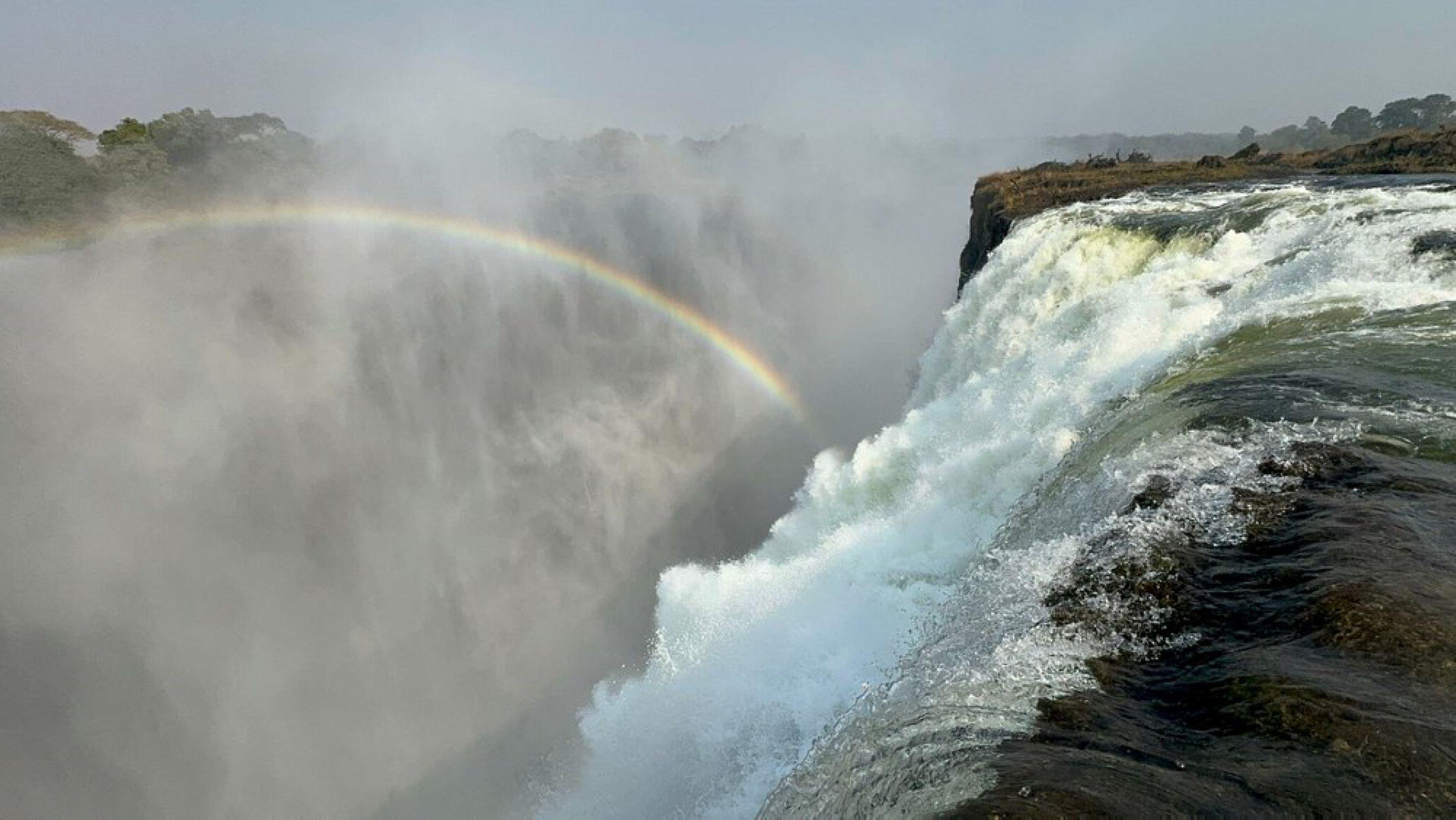 Livingstone Triple Adventure: Rhino Walk, Falls Tour & Zambezi Sunset Cruise