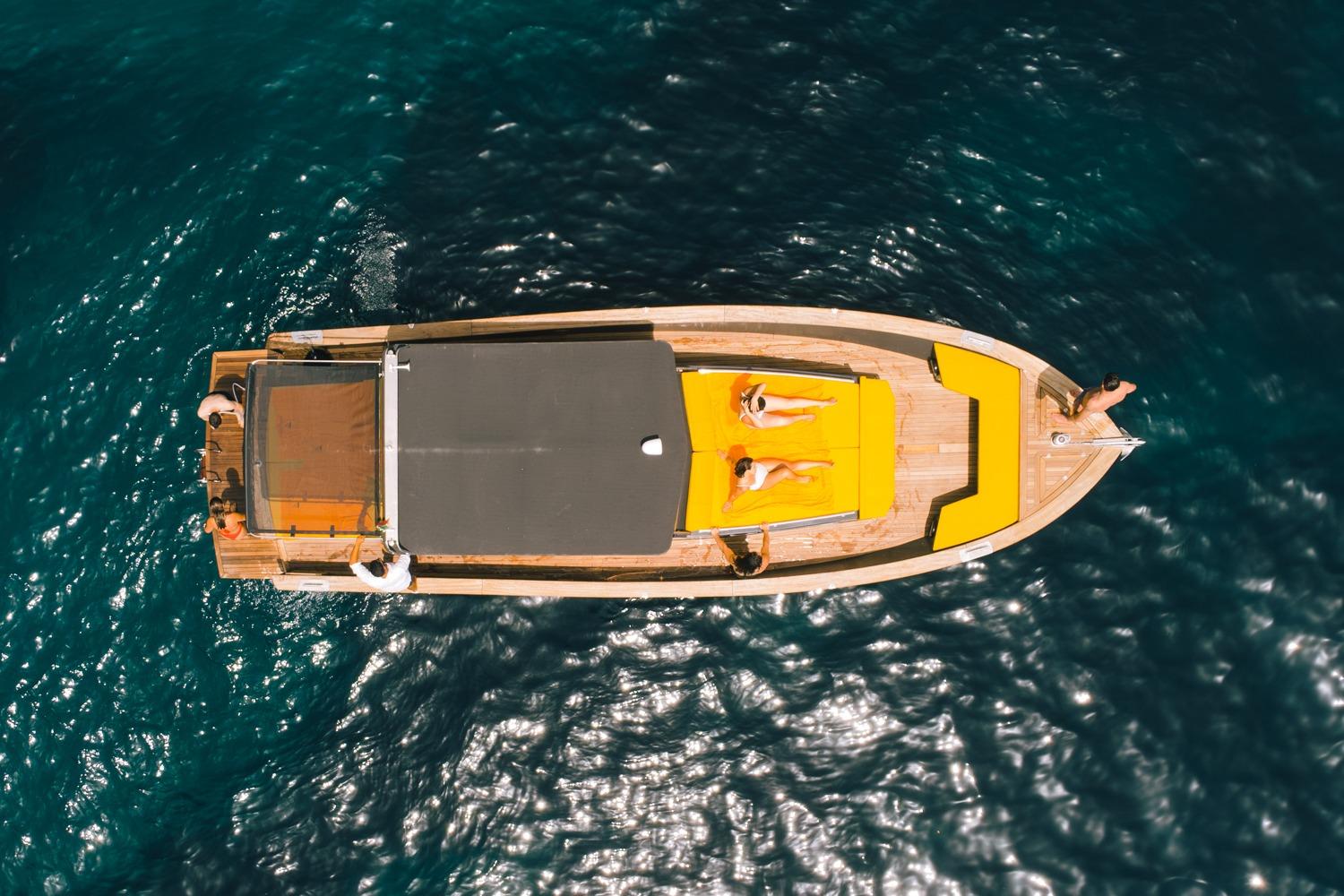 Amalfi Coast Gozzo Boat Tour: Caves, Beaches & Prosecco from Positano