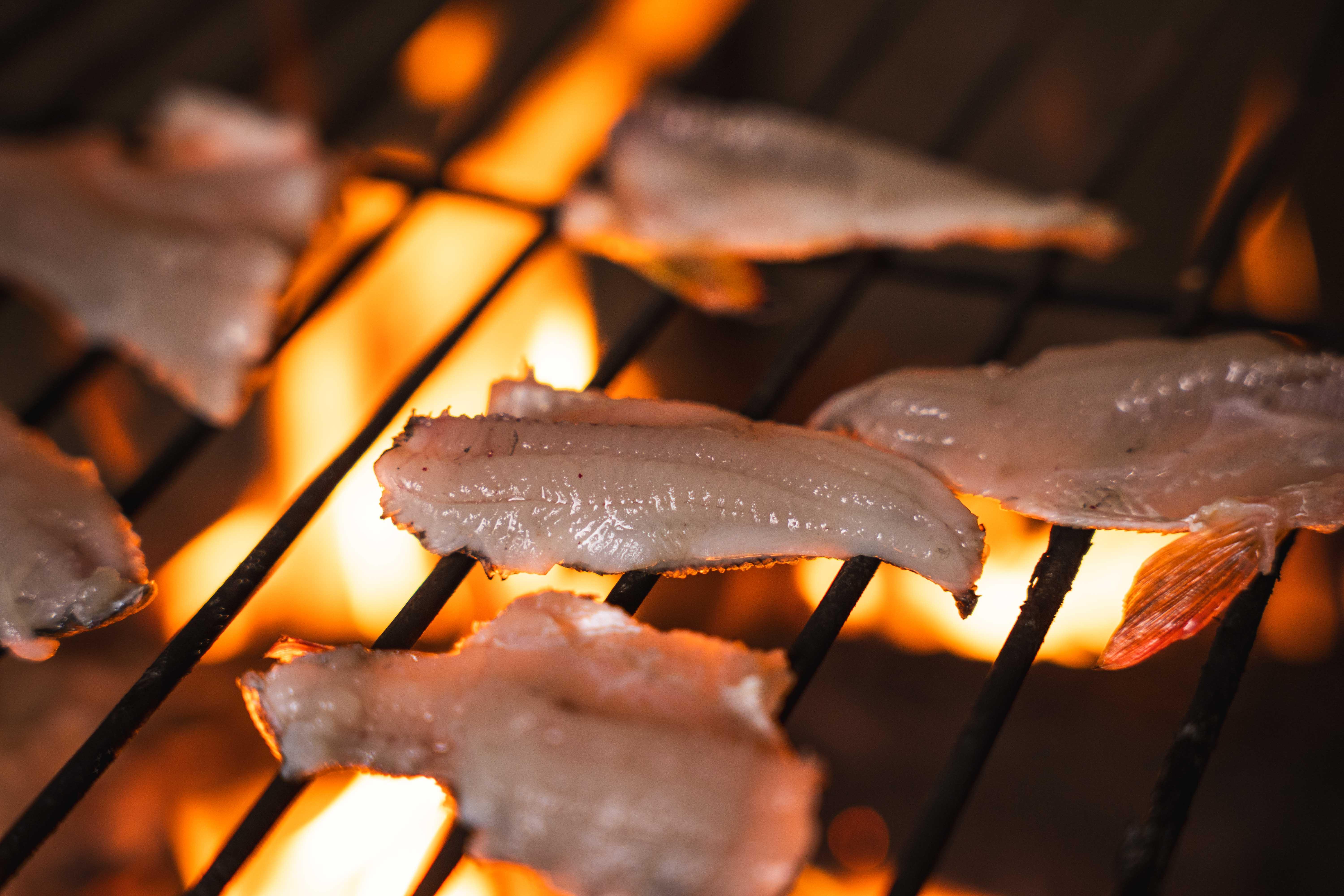 Rovaniemi Ice Fishing on a Frozen Lake with BBQ & Photos