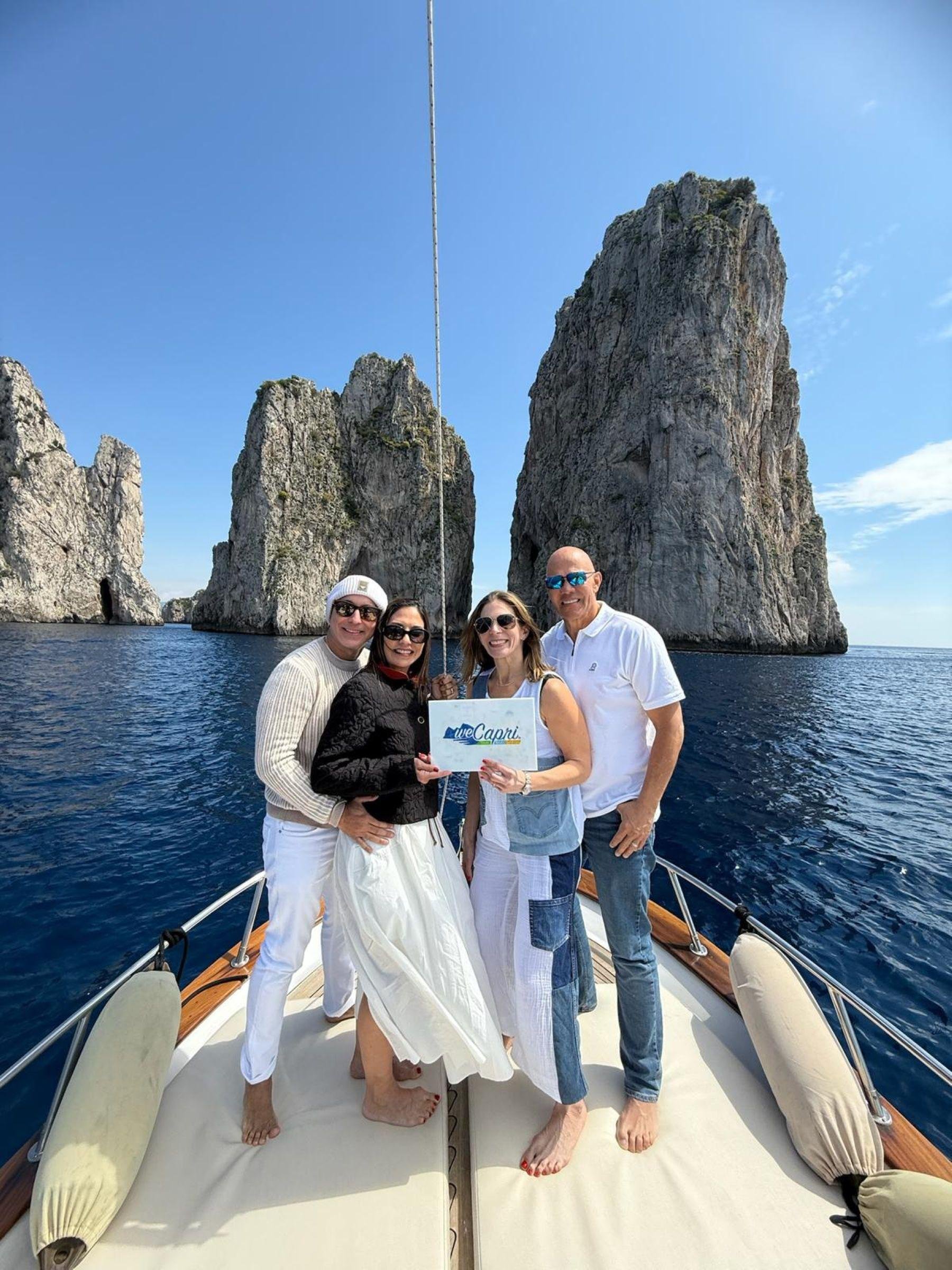 Capri Private Boat Tour: Faraglioni, Sea Caves & Swimming Stops