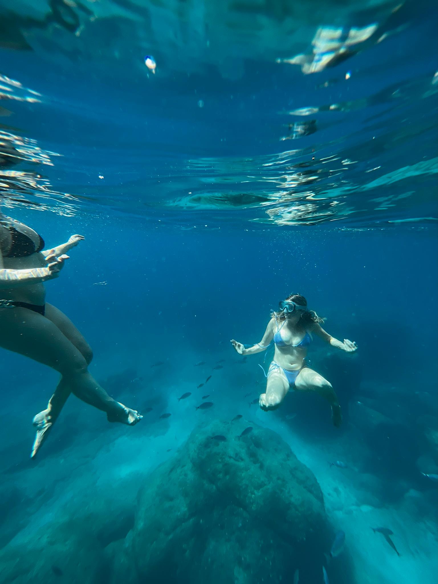 Capri Private Boat Tour: Faraglioni, Sea Caves & Swimming Stops