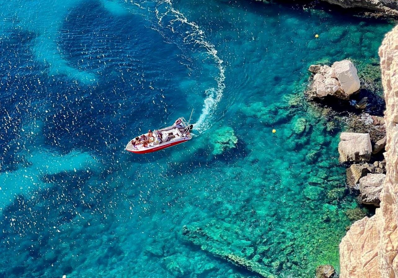 Snorkeling in the Calanques — clear Mediterranean water and rocky limestone formations near Cassis, France
