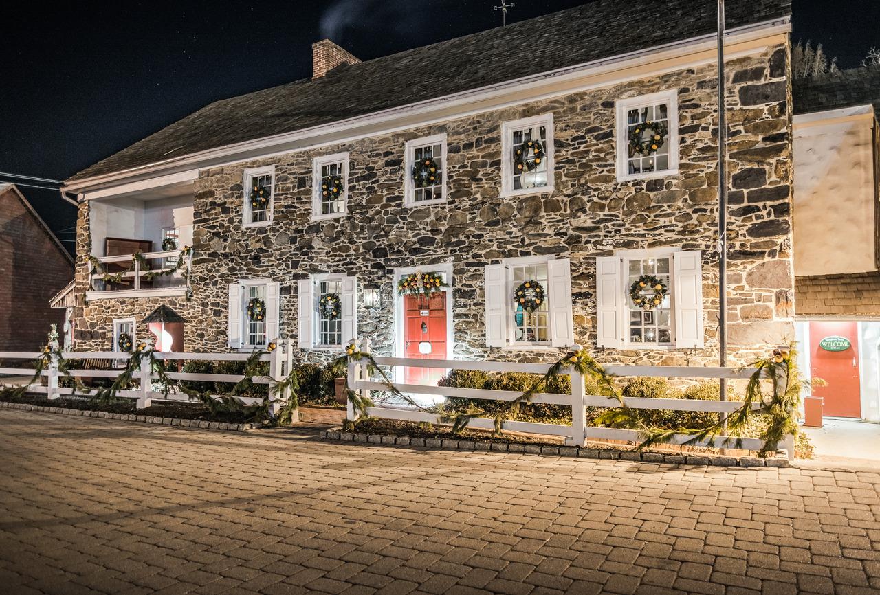Haunted Farnsworth House bullet holes in south wall, Gettysburg ghost tour landmark