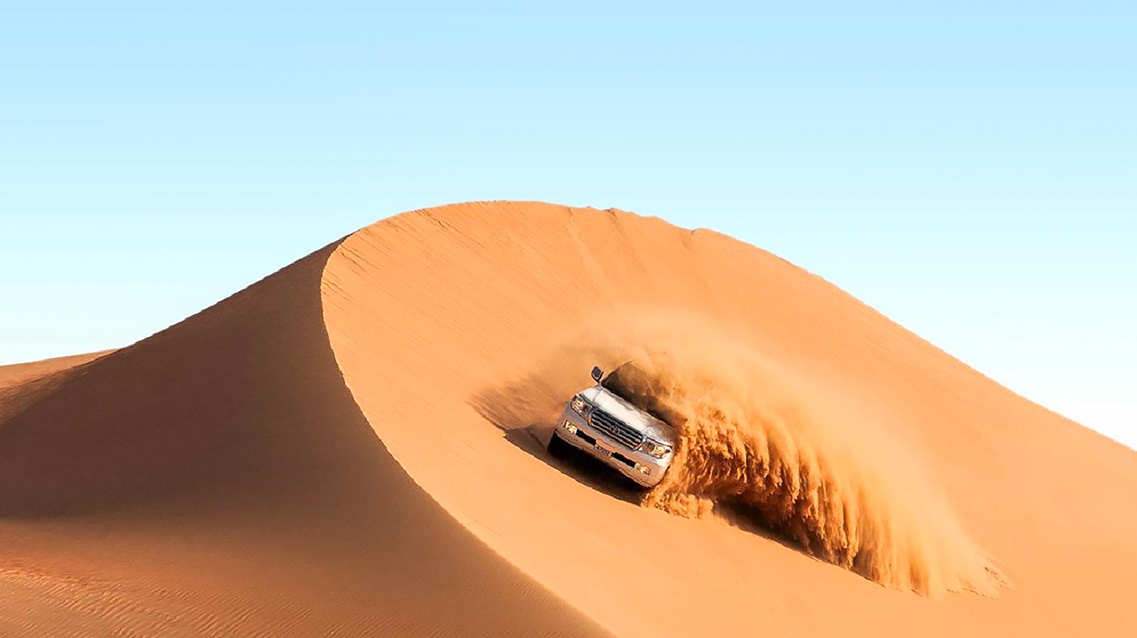 Dubai Desert Safari: Dune Bashing, Camel Ride & BBQ Dinner