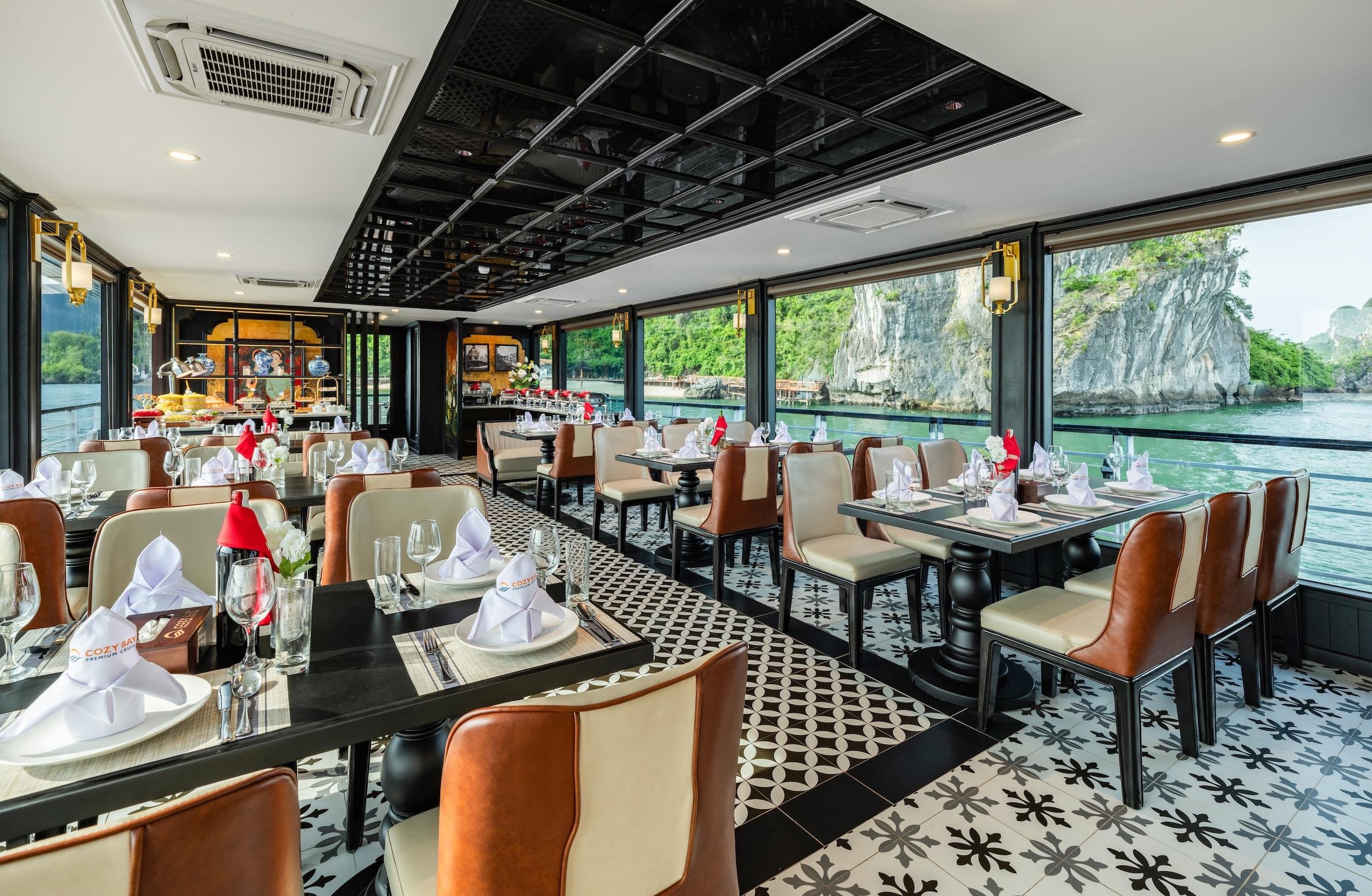Halong Bay Luxury Day Cruise: Caves, Kayaking & Sunset Party