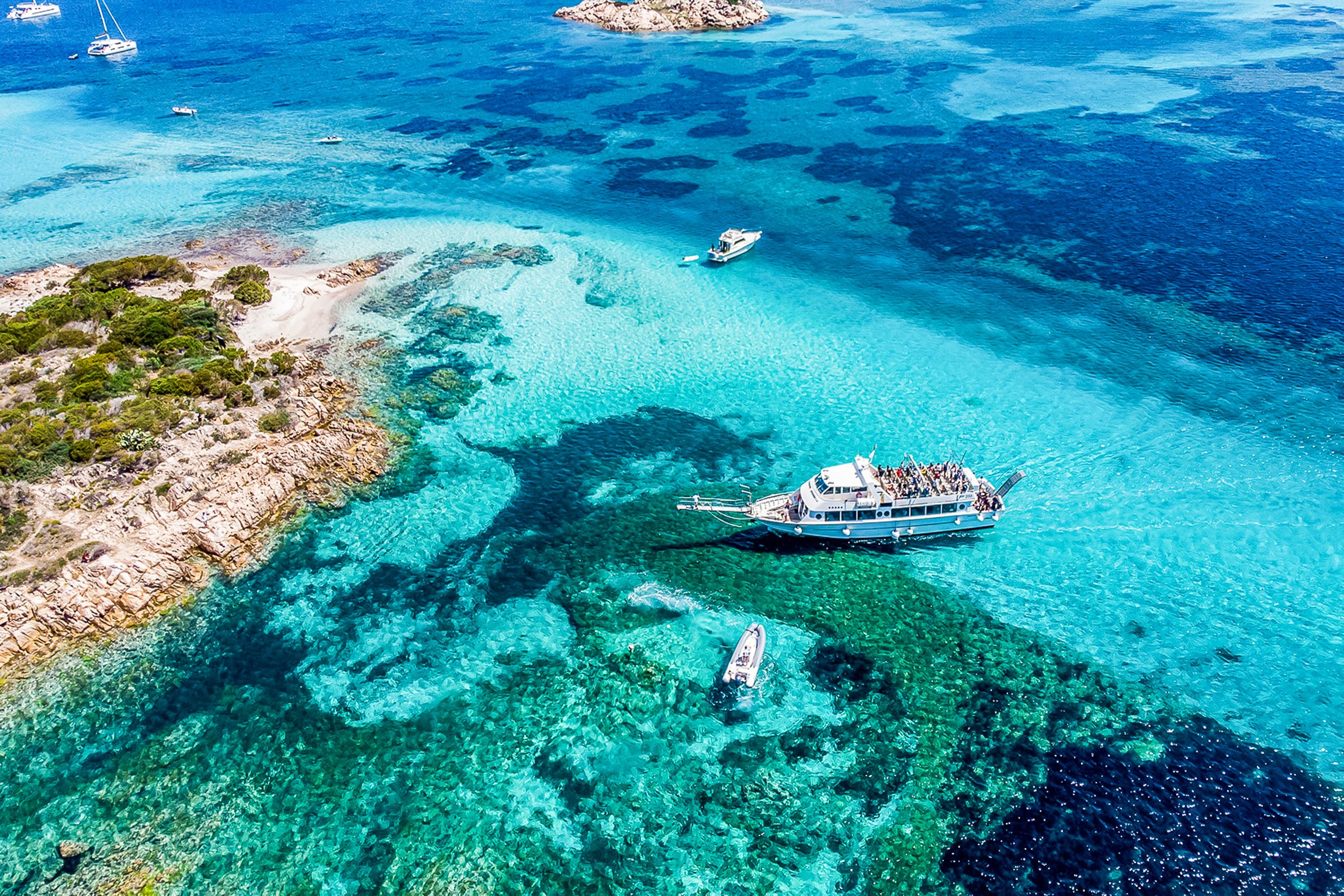 La Maddalena archipelago full-day boat tour past emerald islands and white-sand beaches, Sardinia
