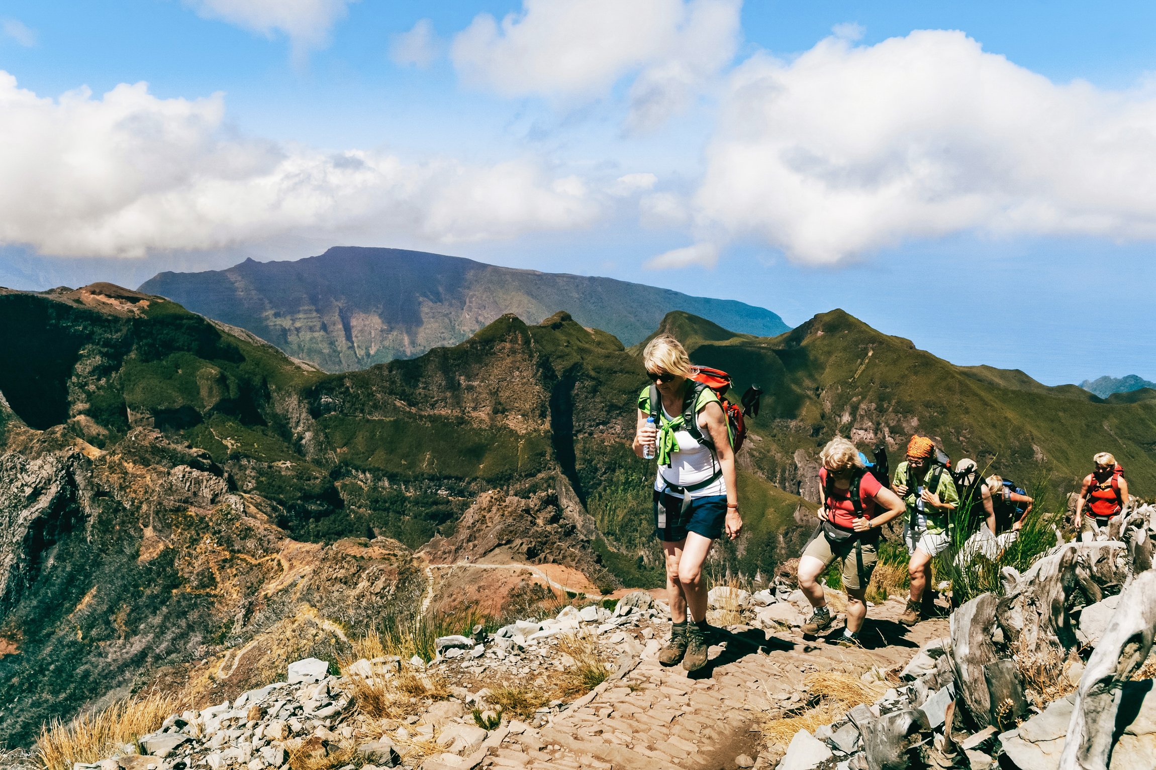 Hikers on the PR1 Stairway to Heaven ridge between Pico do Arieiro and Pico Ruivo, Madeira