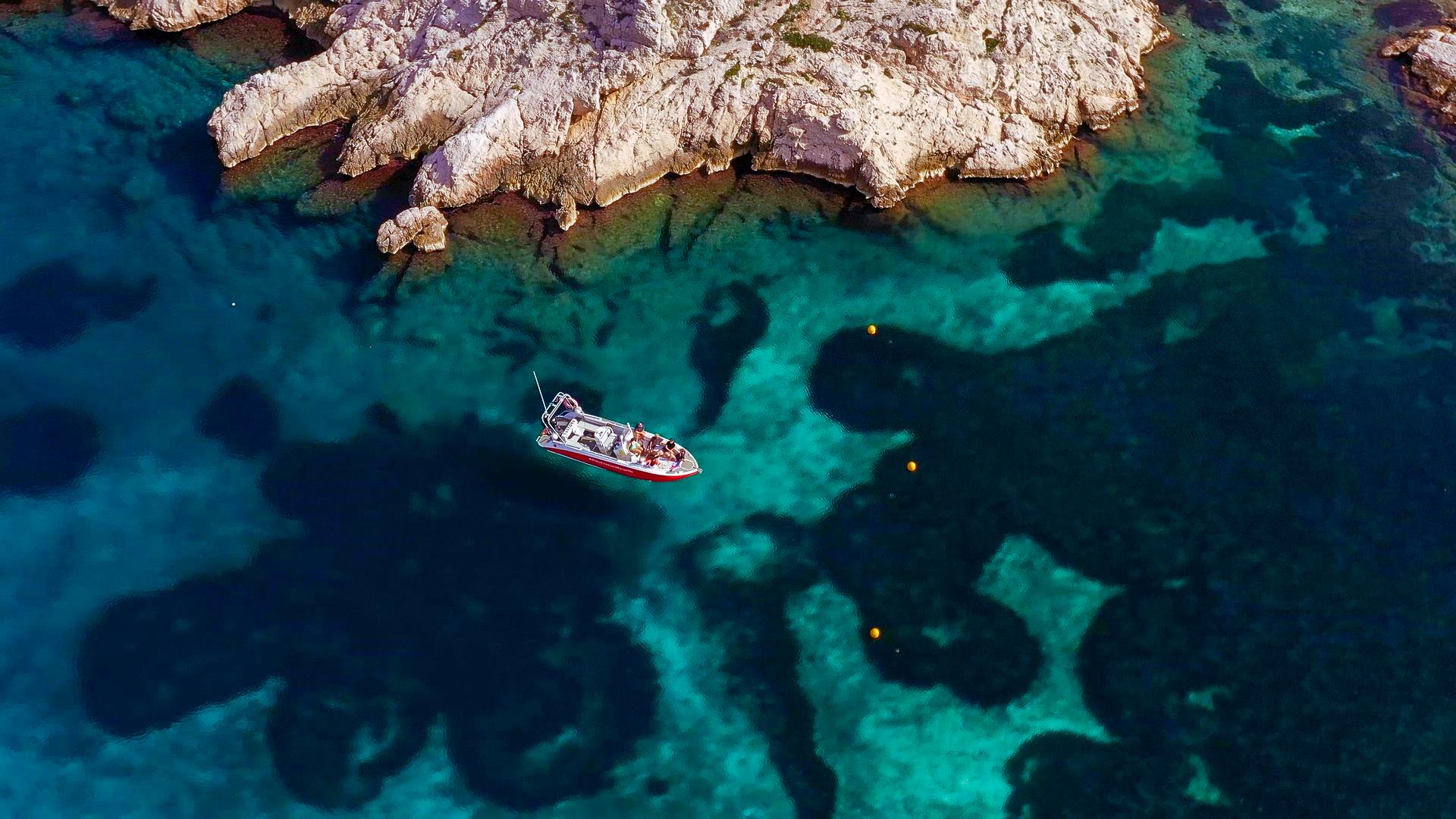 Calanque de Morgiou from the sea — hidden cove with turquoise water on a Marseille to Cassis boat tour